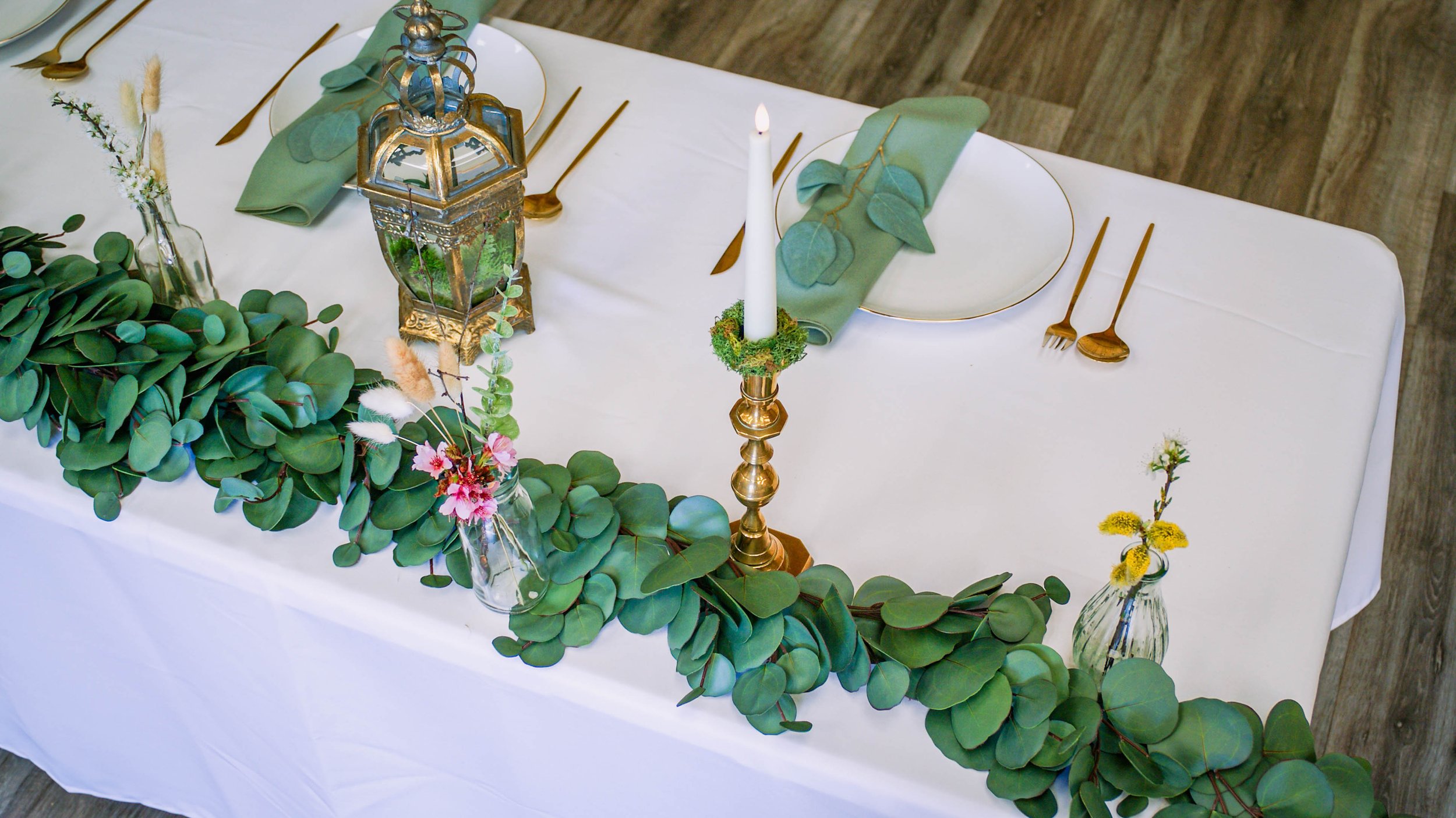 Almost real silver dollar eucalyptus garland runner.jpg