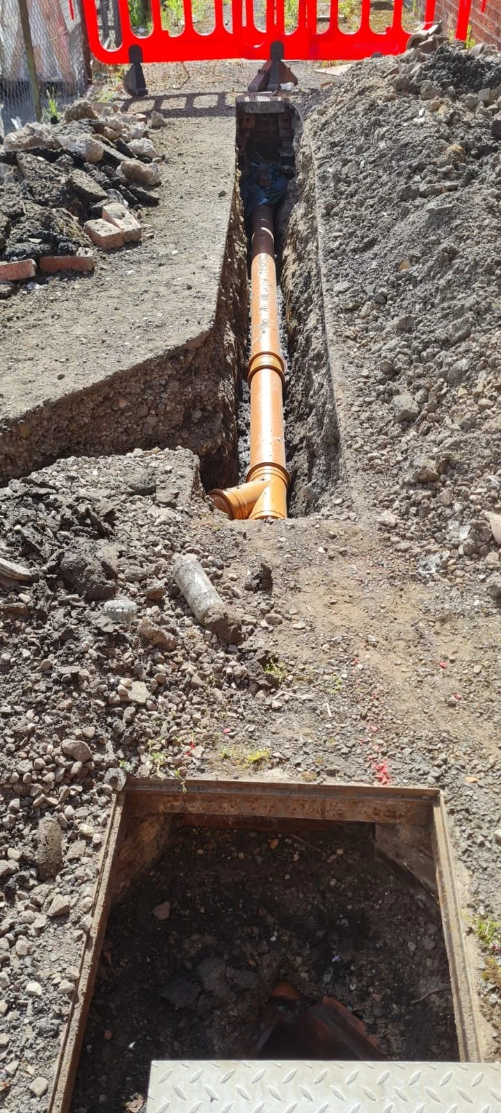 Replacement of collapsed drain.jpg