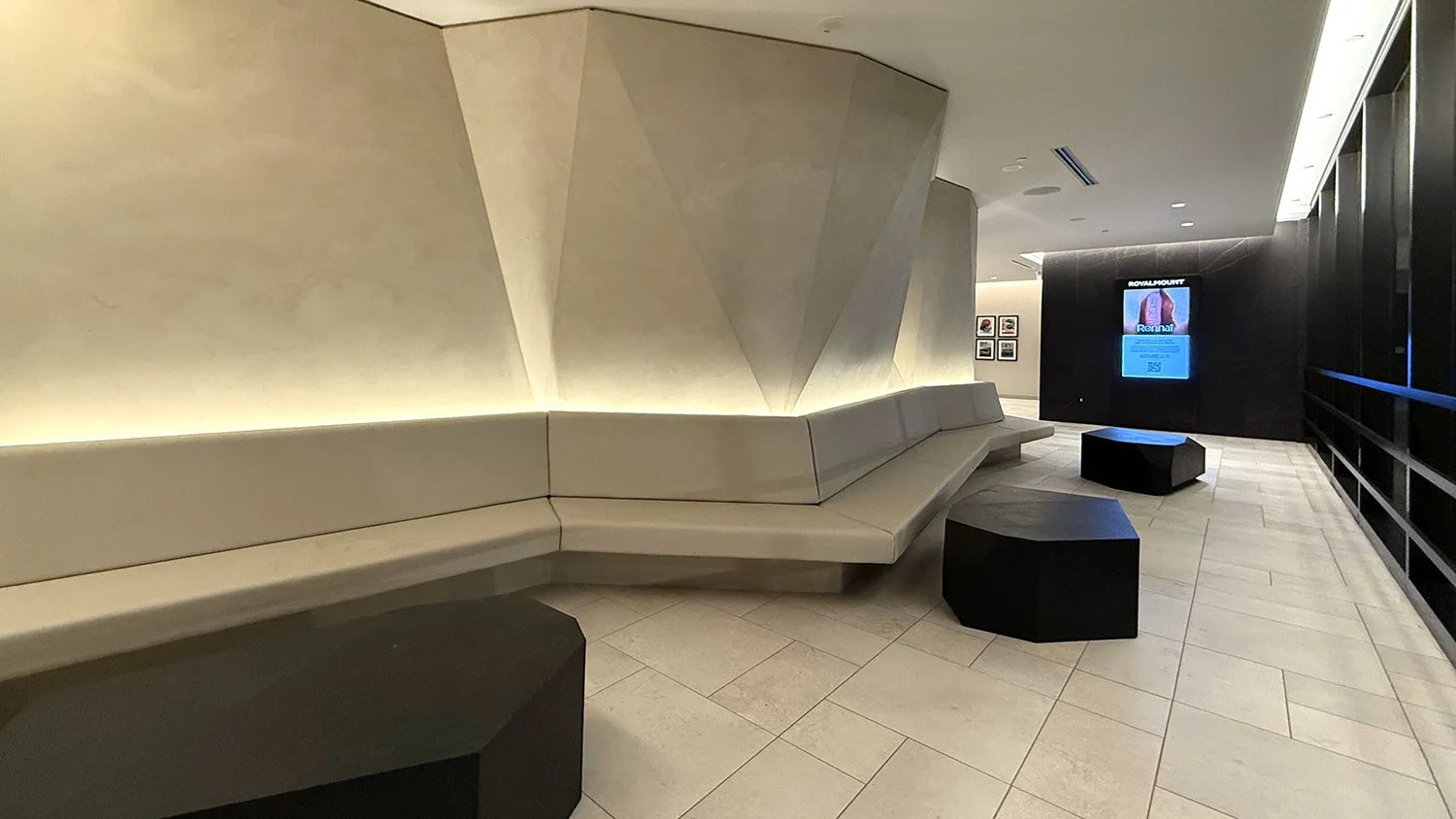 Royalmount parking seating area-porsche faceted walls