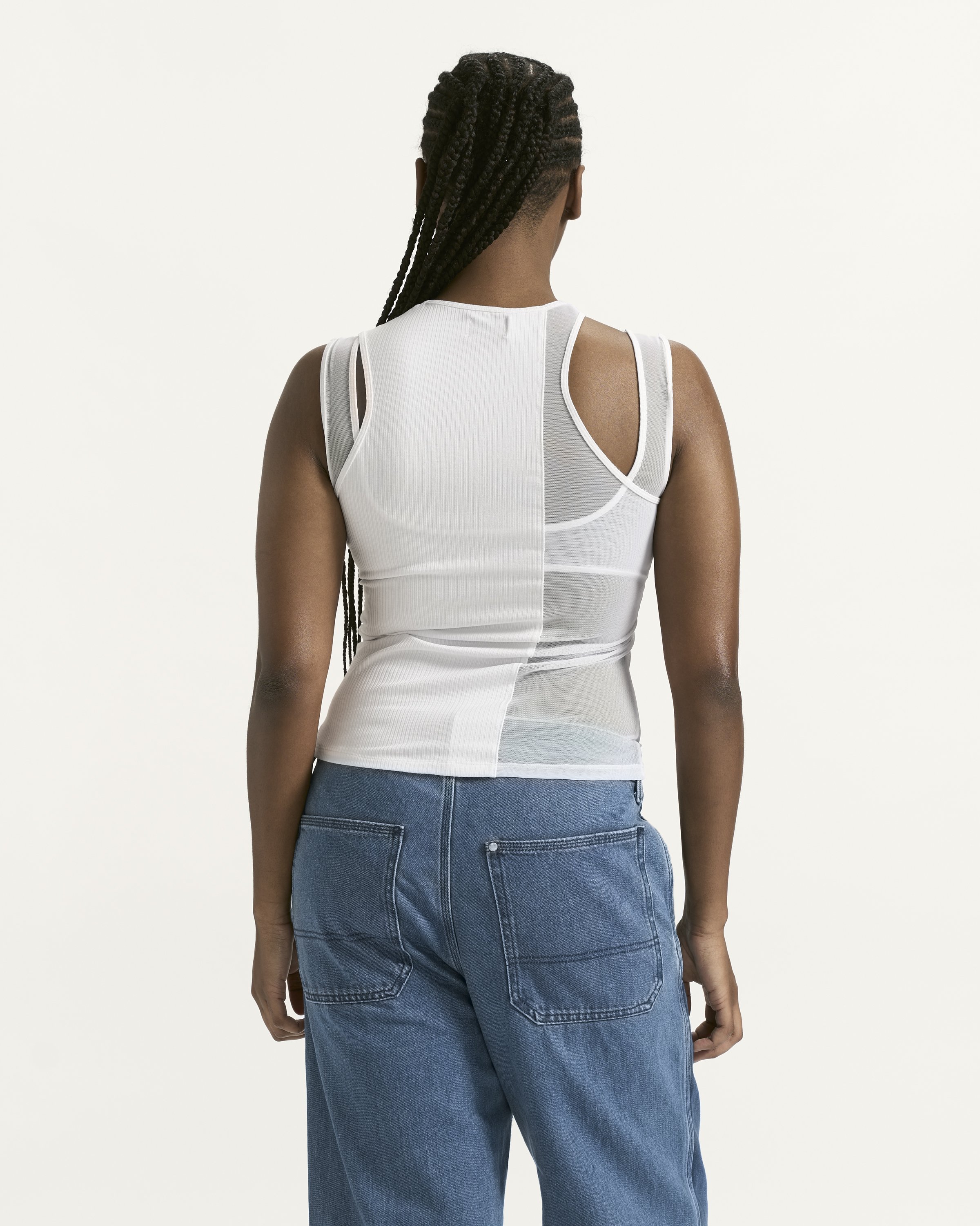 Wynn asymmetrical mesh and rib top. Curve hugging. Elevated basics made to order in Toronto. Wynn high end elevated basics. Layered with wynn mesh bra