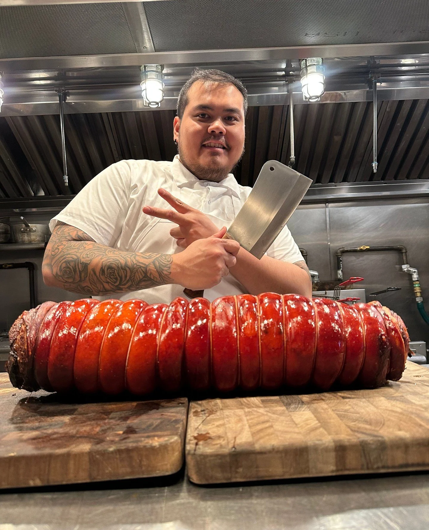 Who&rsquo;s the real star of the show at Naks? Chef Eric or the glistening, crackling log of lechon? You know the answer, don&rsquo;t play. 🐖⁠
⁠
Come by for the juicy, roasted, crispy-skinned Filipino pork, stay for the happy, knife-weilding, Filipi