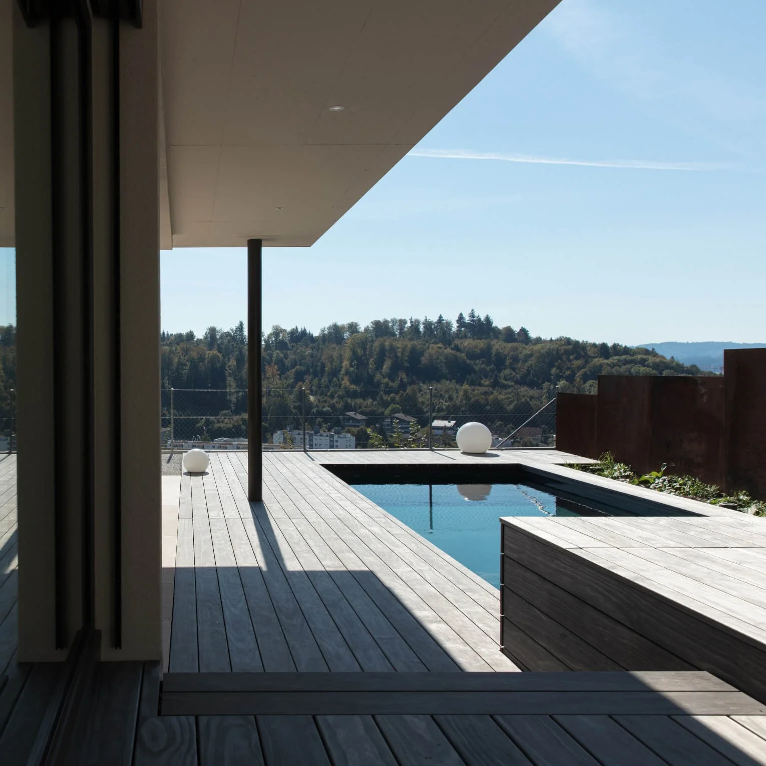 Composite decking products that incorporate the natural beauty of real wood