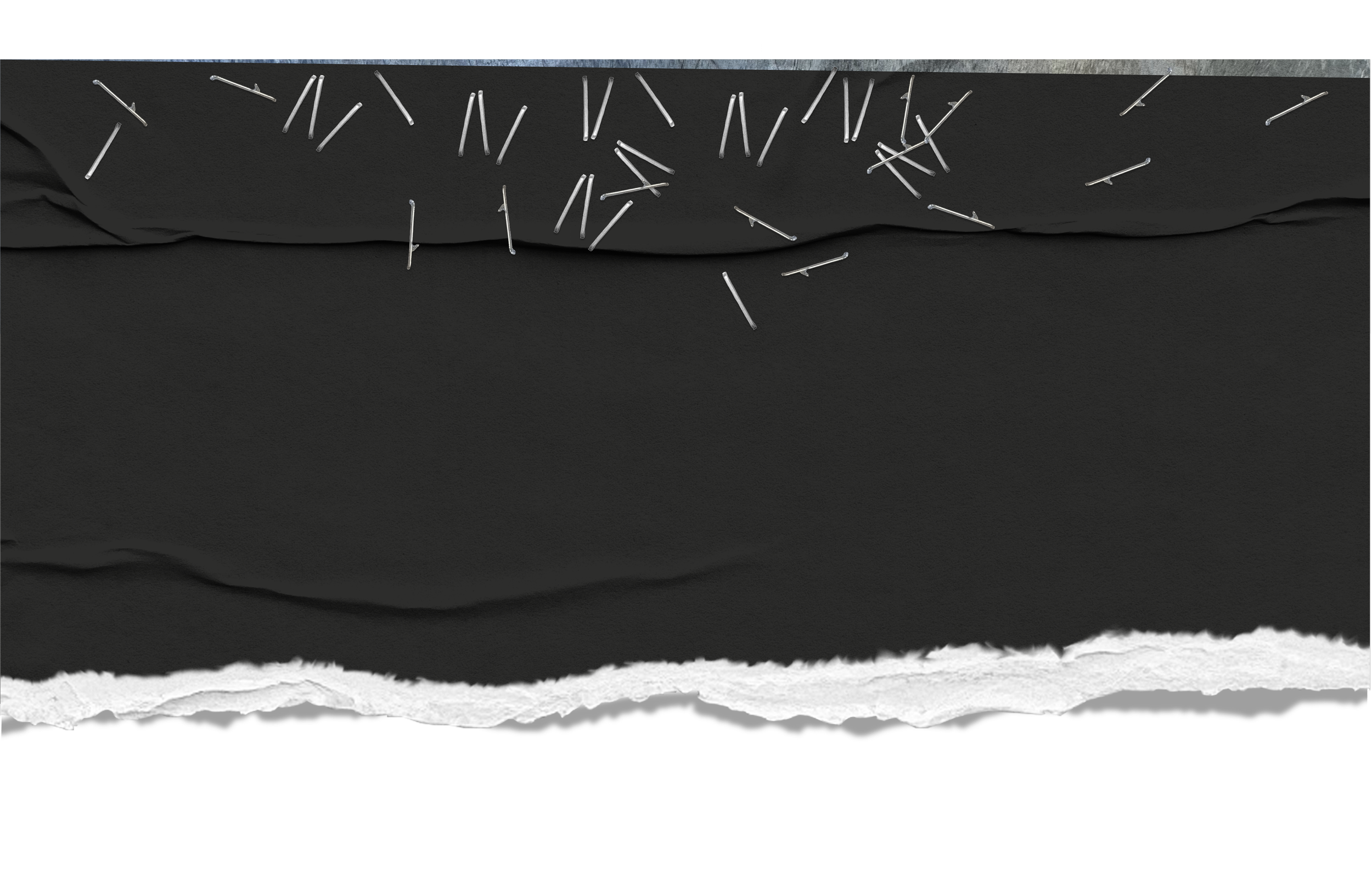 A close-up of a torn black fabric surface with scattered sewing pins, some of which are embedded into the fabric, and a section of metallic material above.