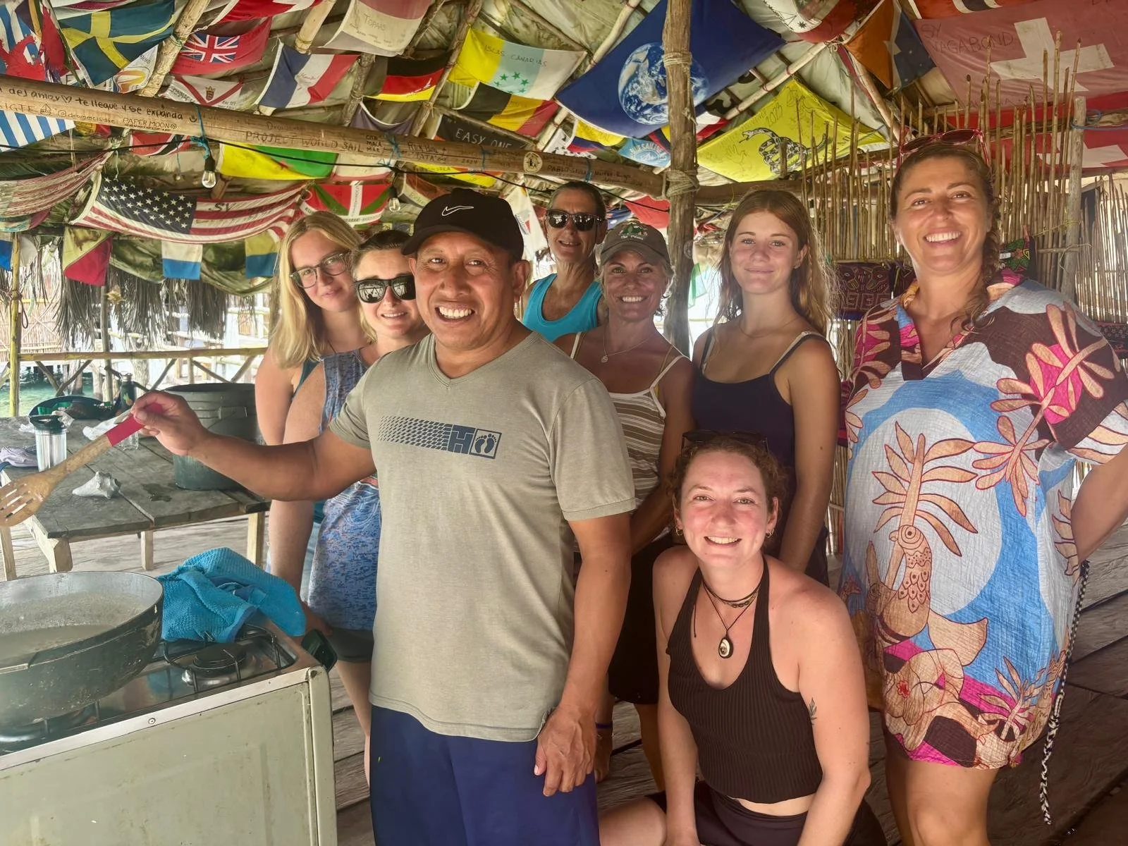Ibin and the ladies learning the process of making coconut oil one morning