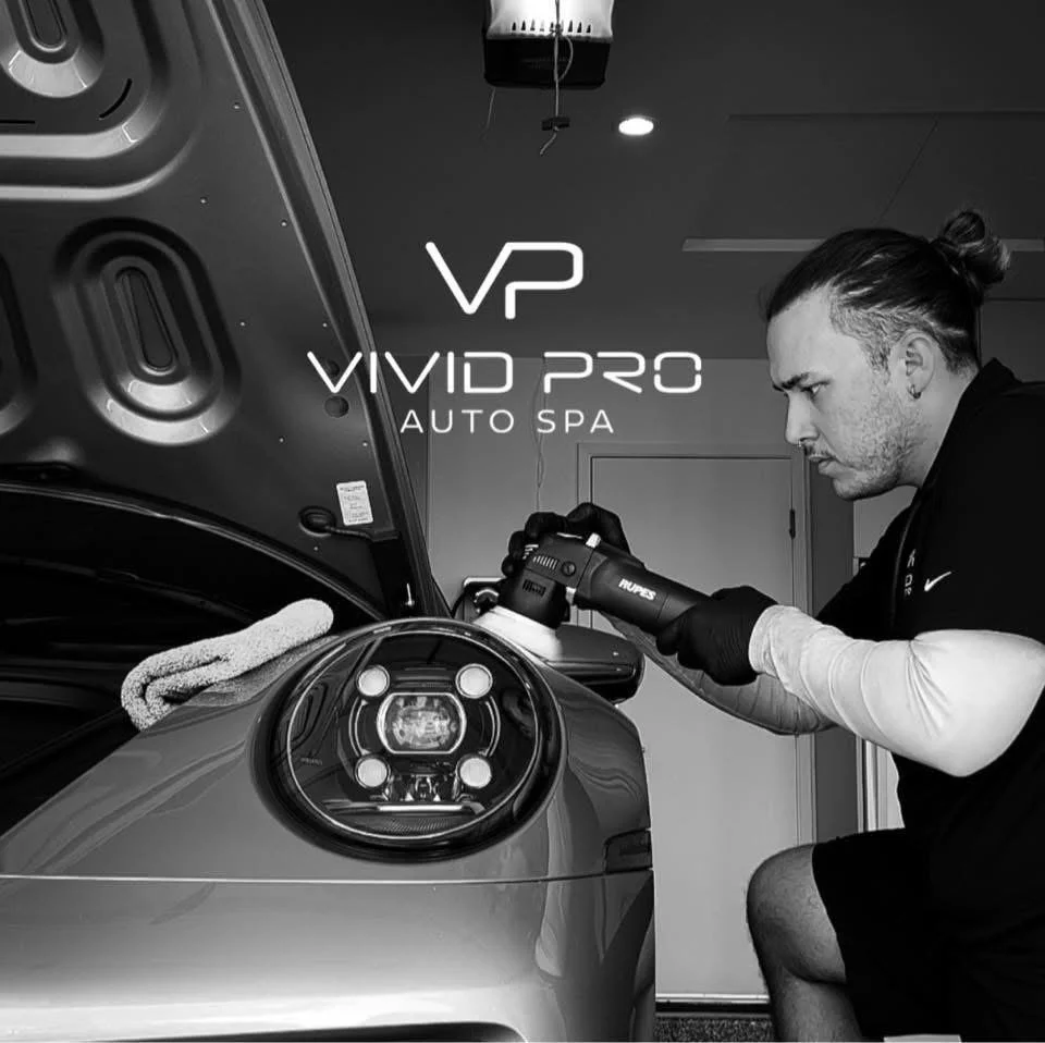 Michael Vargason, Owner of Vivid Pro Auto Spa, a Mobile Detailing Company detailing a Porsche 911.