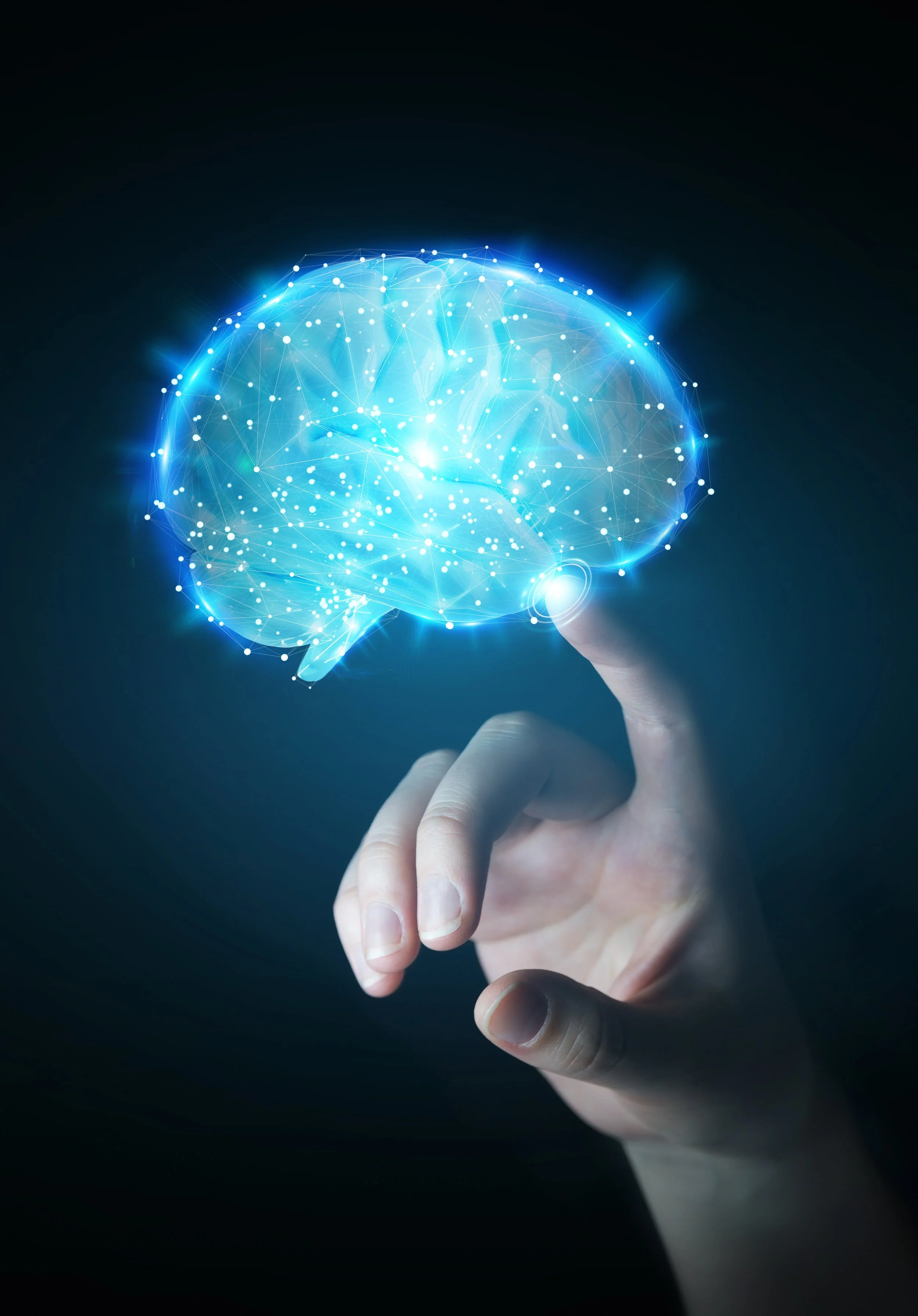 A human hand with fingers slightly bent appears to hold a glowing, digital representation of a brain, depicted with interconnected bright lines and dots, against a dark background.