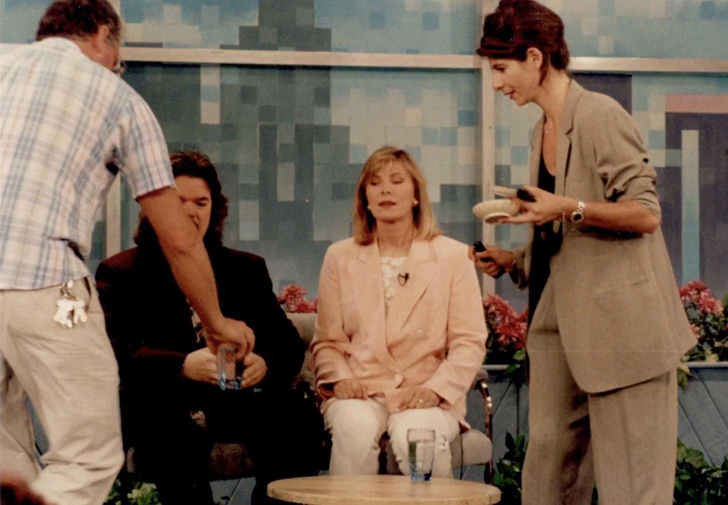 Robin doing makeup at News.JPG