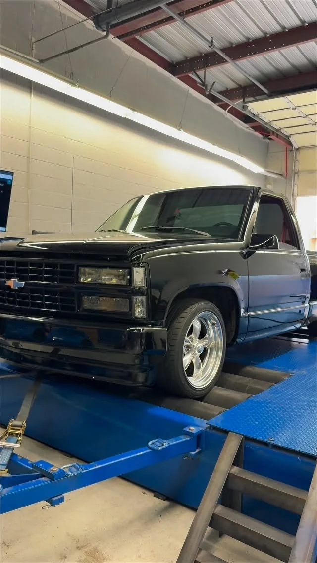 Two-tone 1988 Chevrolet C1500 on the shop dynamometer