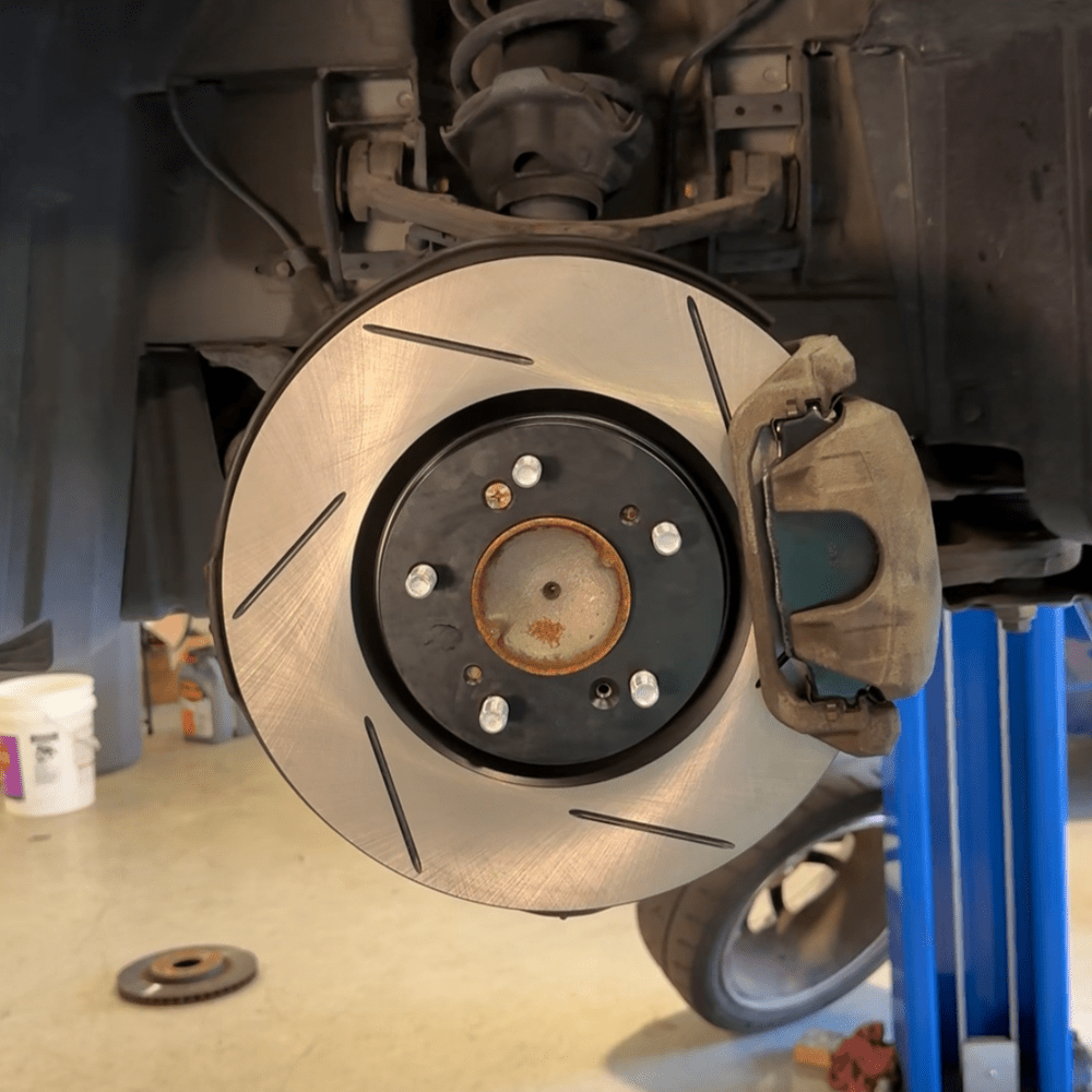 Slotted brake rotor and performance brake upgrade installed at Scottsdale Car Care and Speed Shop