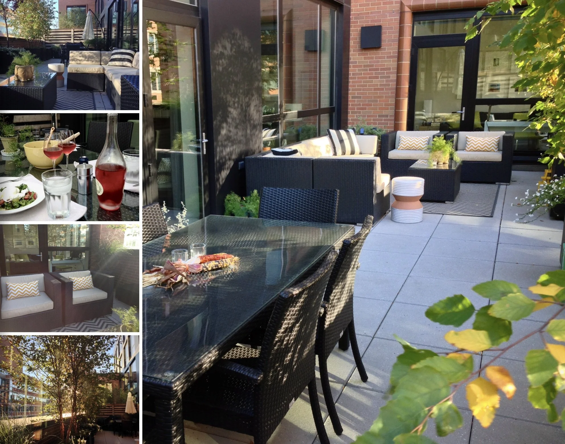 Urban outdoor terrace with modern lounge seating, dining area, and greenery set against a brick building
