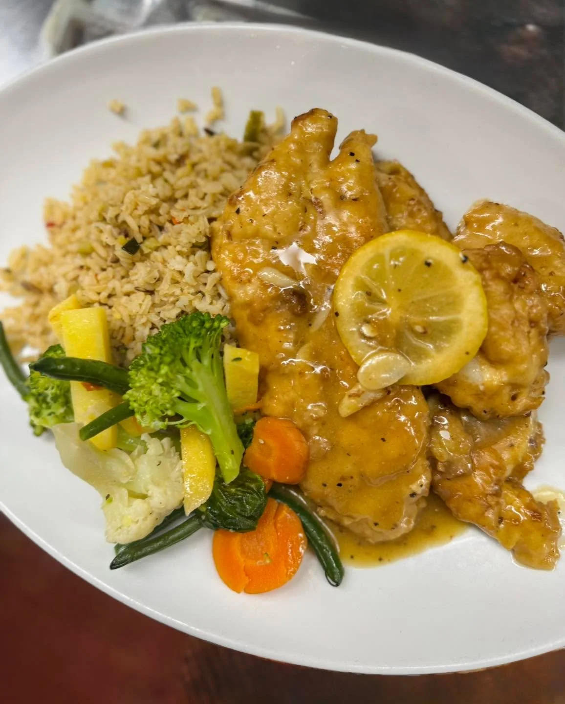 A true classic here at The Coop ✨ Jumbo Shrimp &amp; Chicken Francaise: Lightly egg-dipped, saut&eacute;ed with garlic and lemon sherry wine sauce, paired with market vegetables 🥕