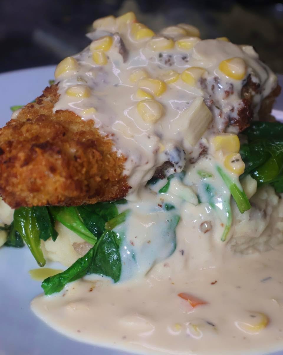 Looks so good you can almost smell it through the photo 🍽️ 

Cornflake-crusted grouper with roasted garlic mashed potatoes, saut&eacute;ed spinach, roasted corn &amp; leek fricas&eacute;.