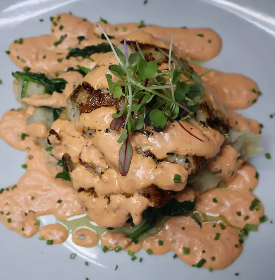 Local Striped Bass paired with roasted garlic mashed potatoes, saut&eacute;ed spinach, and a roasted red pepper &amp; basil aioli.

THIS is a special worth making plans for 🍽️ Call us at (631) 727-8994 to make a reservation!