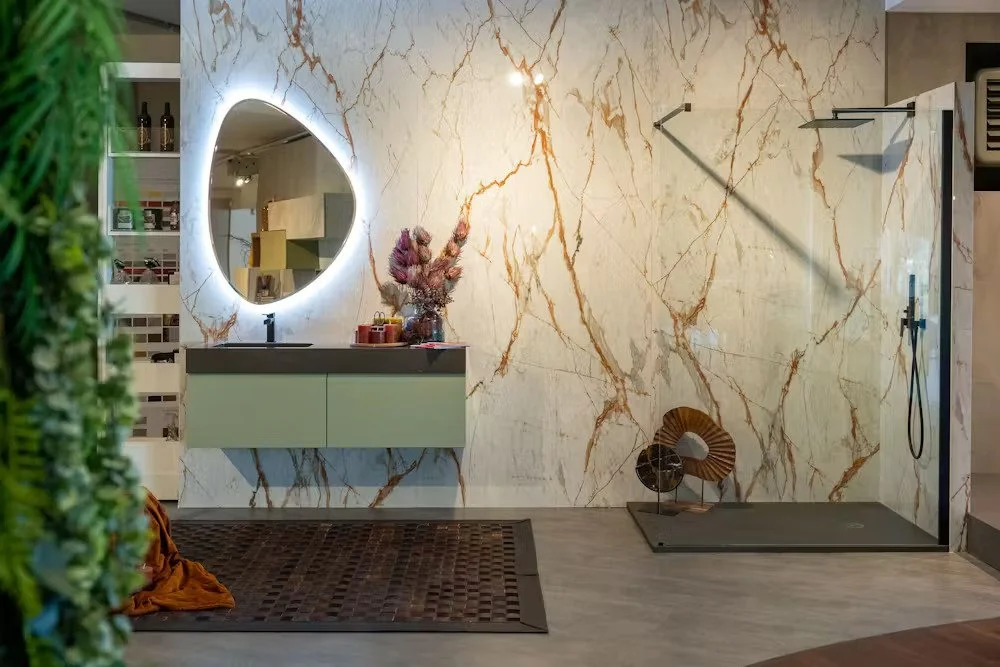 Wall cladding with Dekton awake behind the vanity and walls in a bathroom.