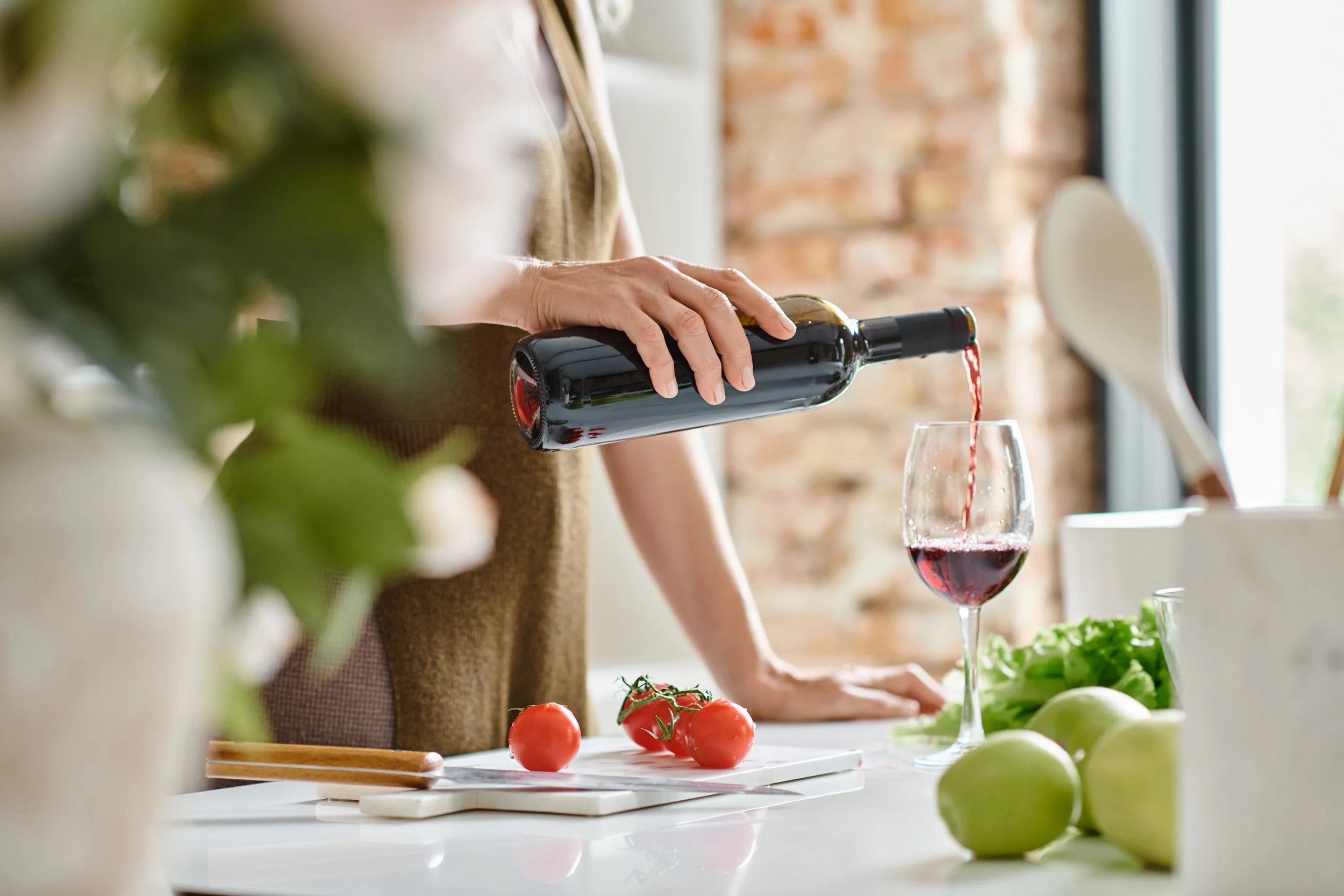 drinking wine in  porcelain countertop because it doent stain like marble.