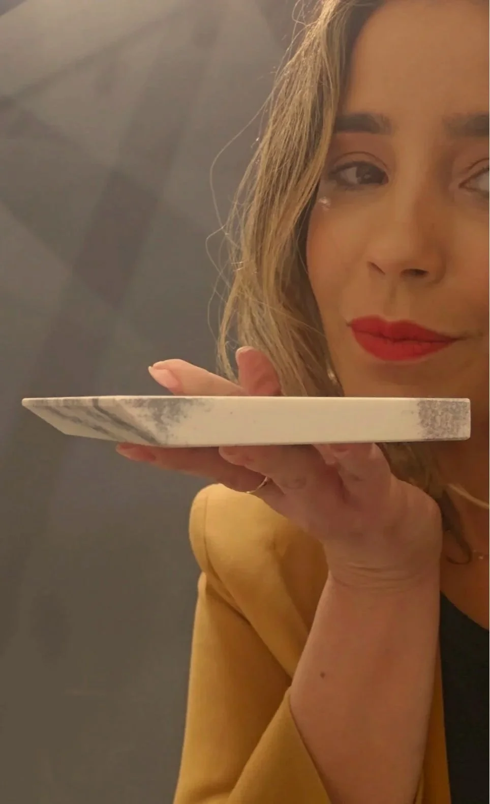 Lais Luz showing shark nose edge porcelain.