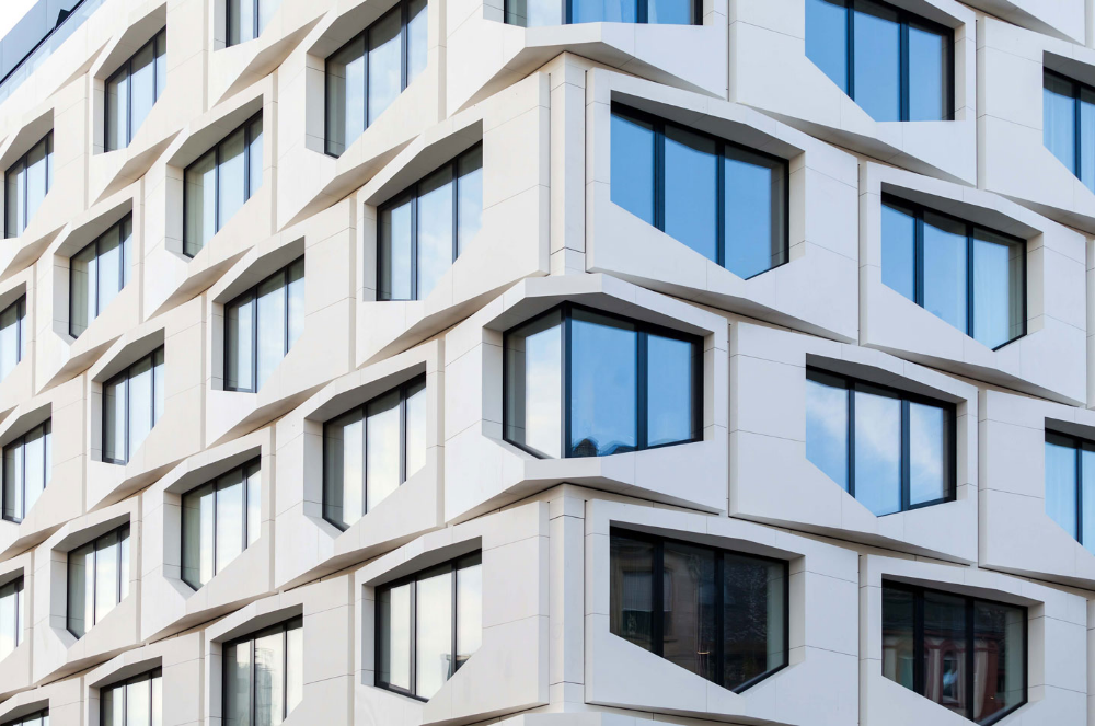 Close-up detail of Neolith ventilated facade system with sintered stone panels.