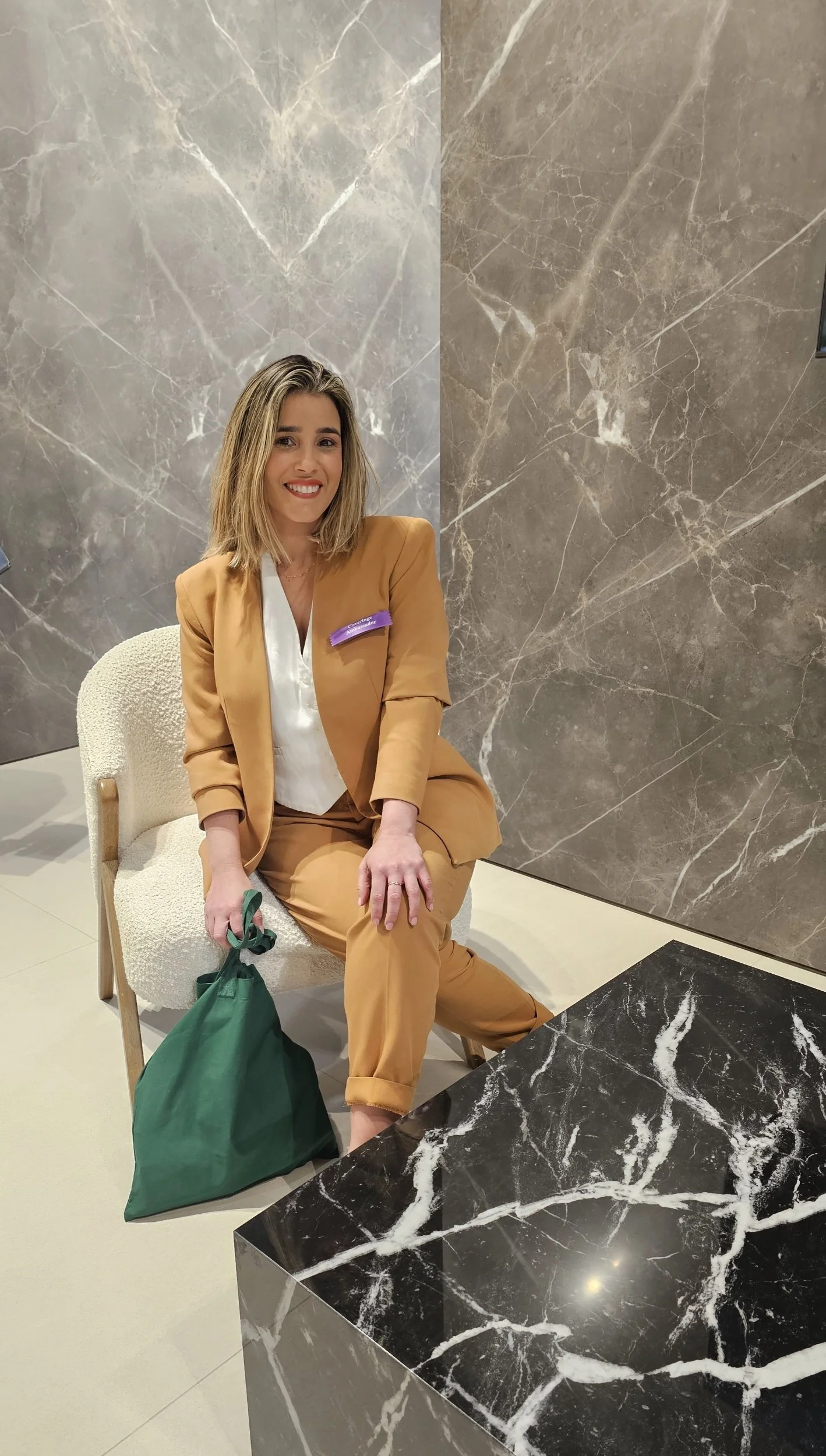 Lais Luz, Founder of Luz Concept 5, at the Anatolia and Aeterna booth during Coverings 2026 in Las Vegas.