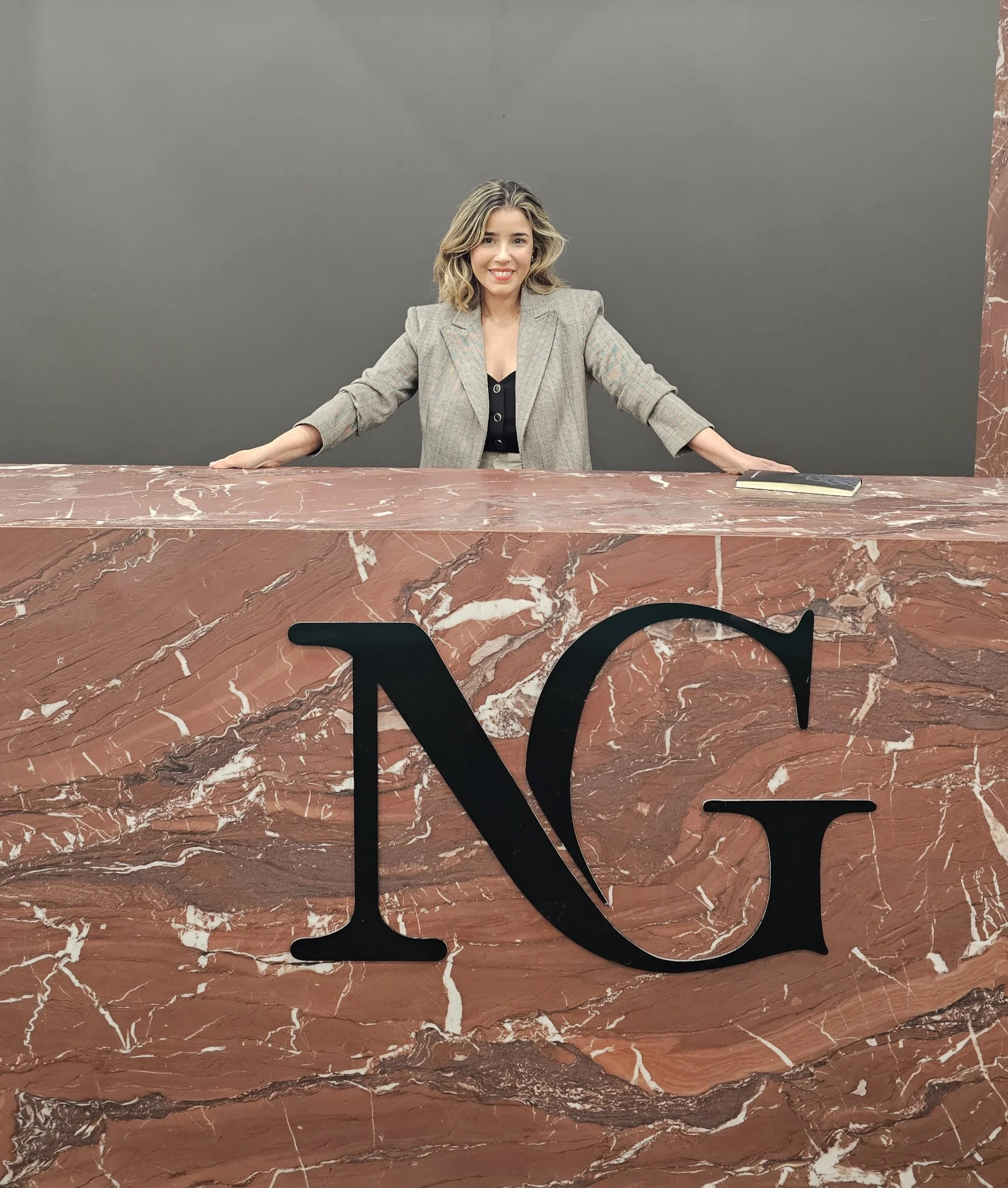 Large-format red marble look porcelain slab with bold veining pattern showcased in full-scale material presentation