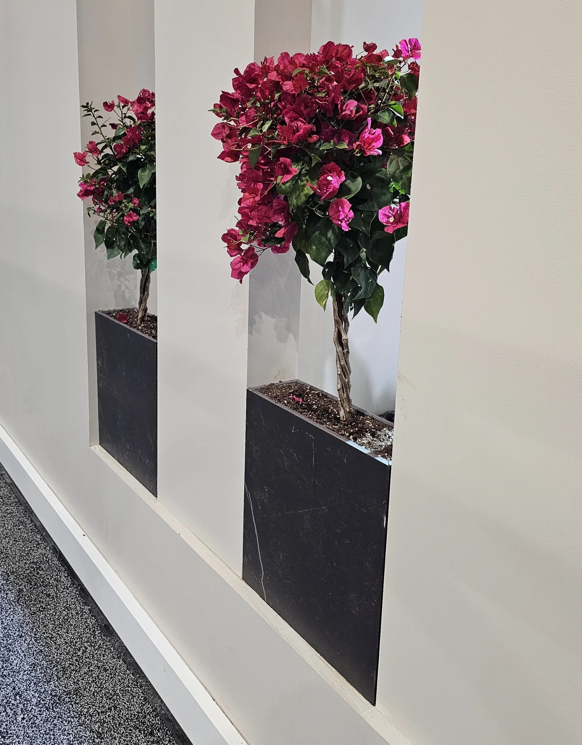 minimalist decor and custom planter made from repurposed porcelain remnants.