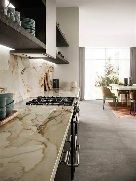 Close-up shot of durable marble look porcelain countertops highlighting the stain-resistant smooth surface and bold warm-toned veining.