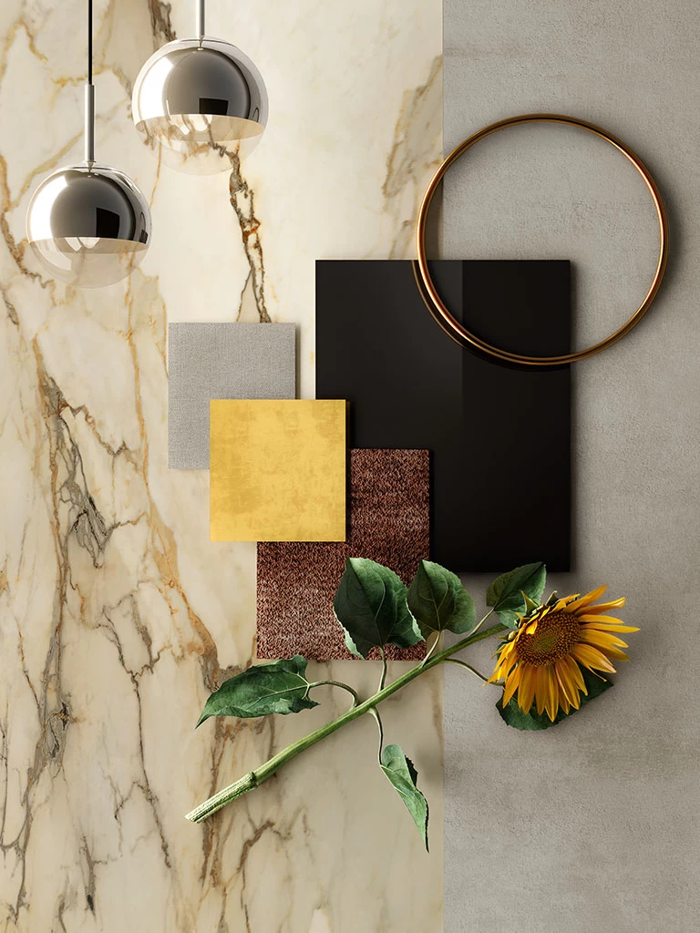 Close up view of an Atlas Plan Calacatta Antique porcelain slab showing the ivory white background with bold dark gray, beige, and orange veins.