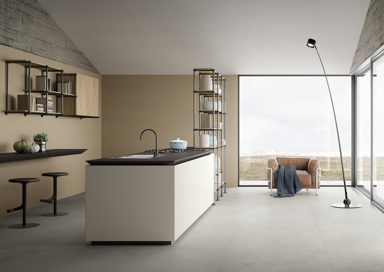 A minimalist kitchen island featuring large-format porcelain integrated shark nose, inspired by high-end European design.
