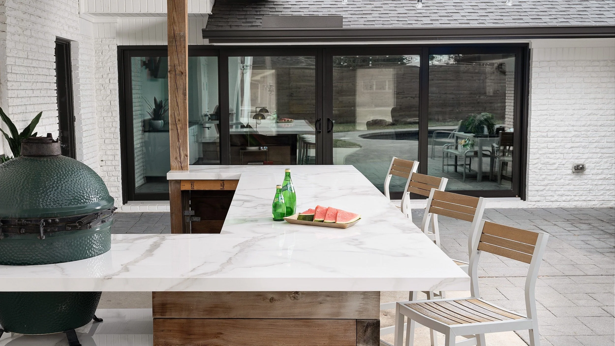 Porcelain-Outdoor-Kitchen-and-Decking-calacatta-marble-white-mitered-edge.jpeg