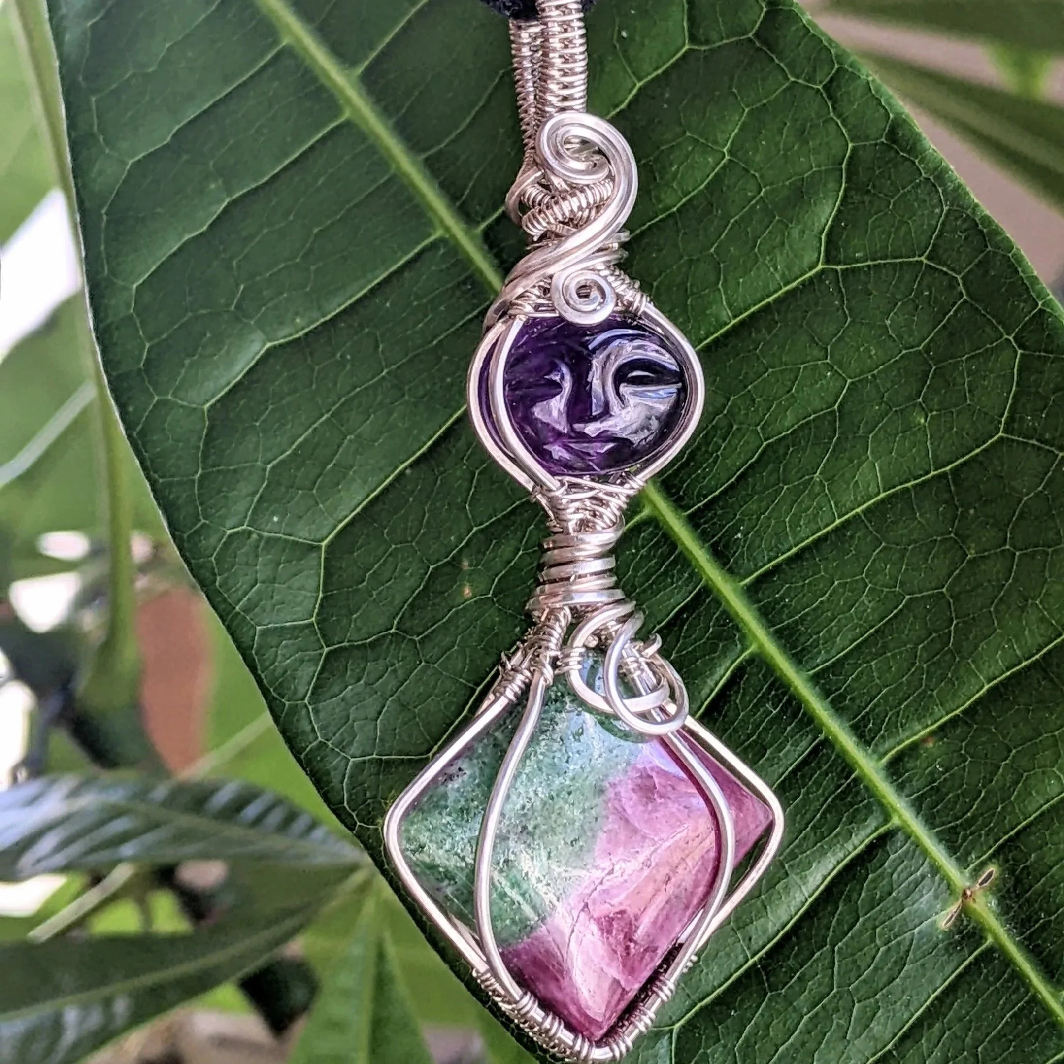 
Sterling Silver Wrapped Ruby Zoisite with Carved Amethyst Amulet on Cord Necklace