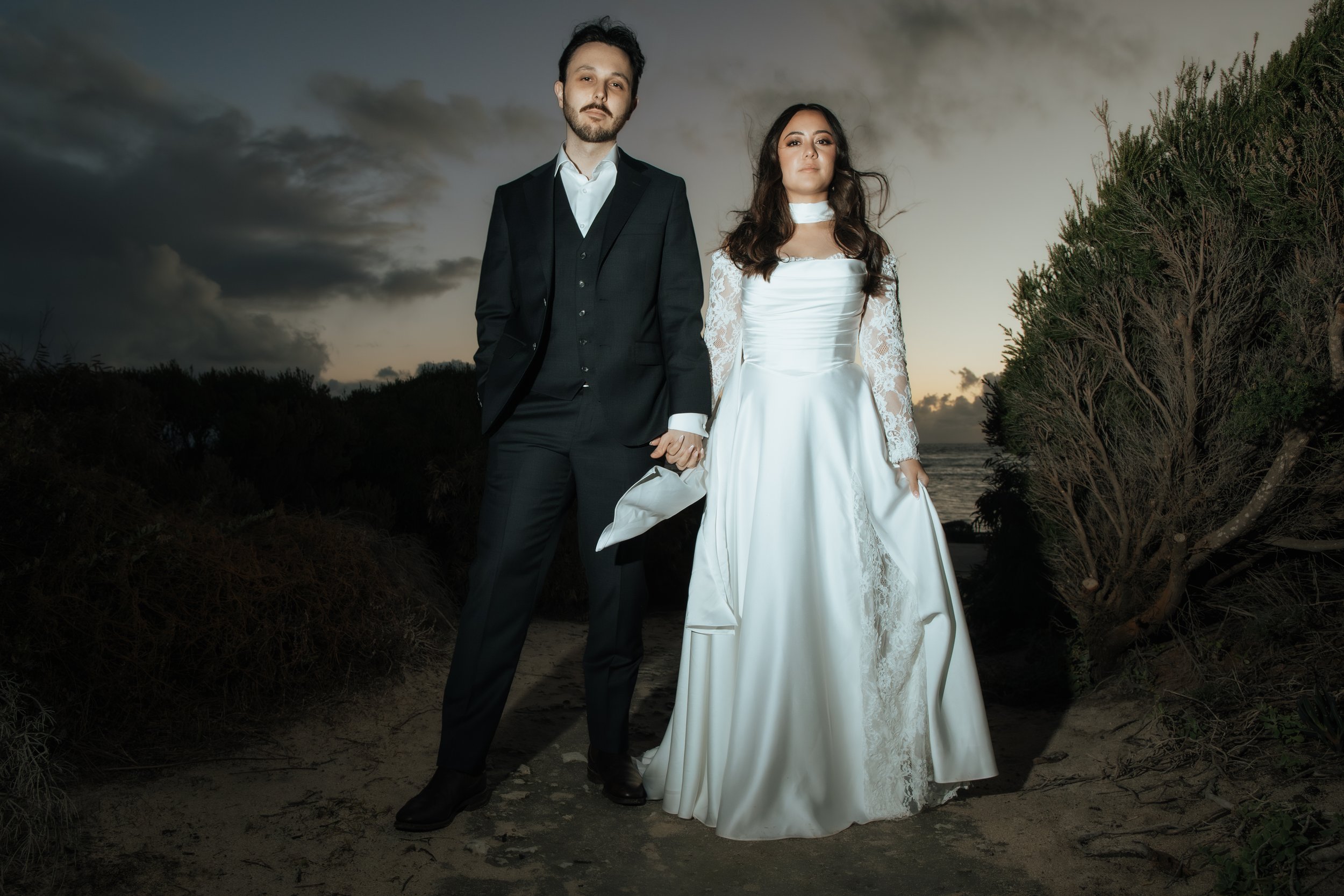 Newlyweds beach sunset flash south west