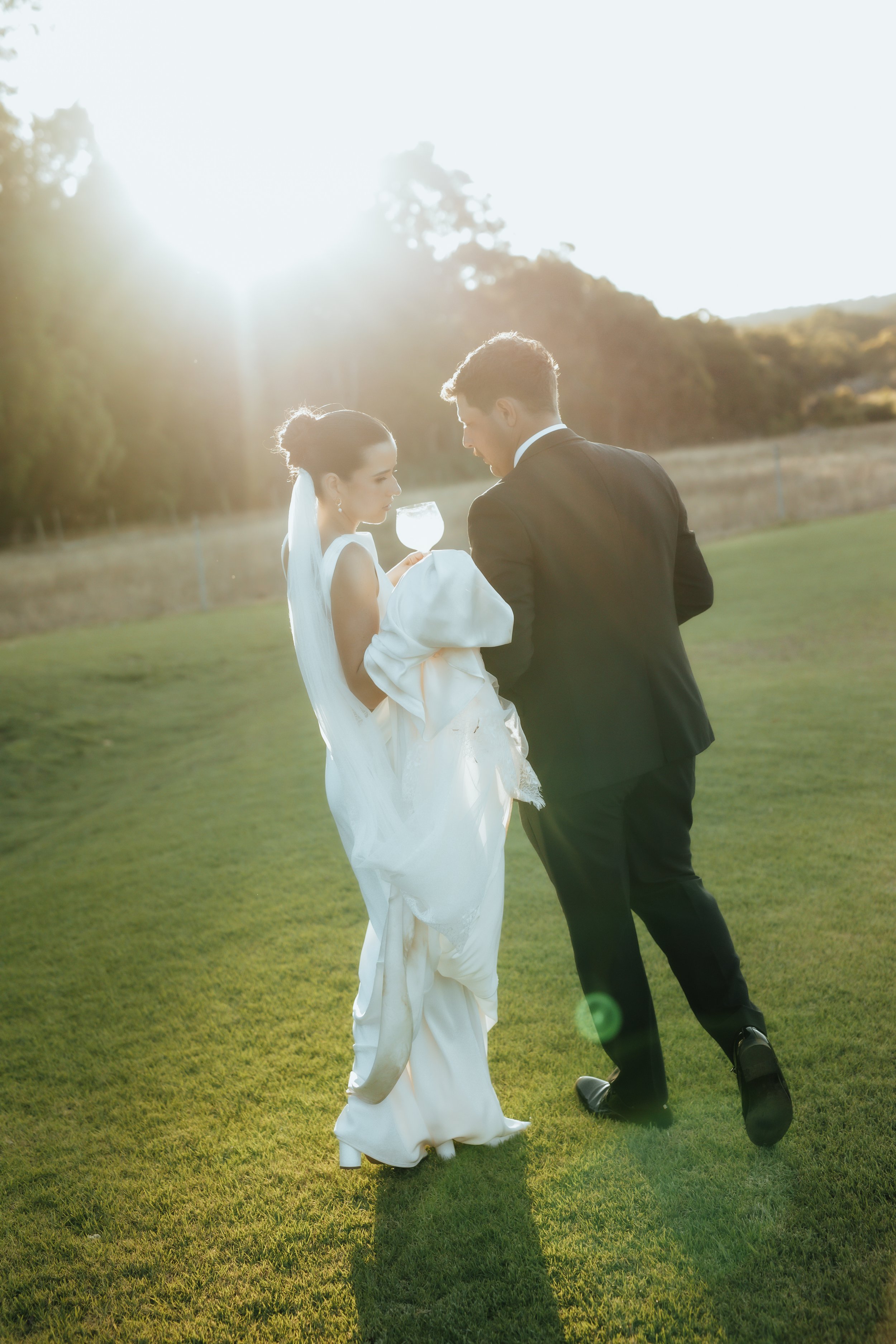 Tiller farm bride and groom Yallingup paddock to plate green grass soft light documentary style photography. wedding photography pricing Australia 