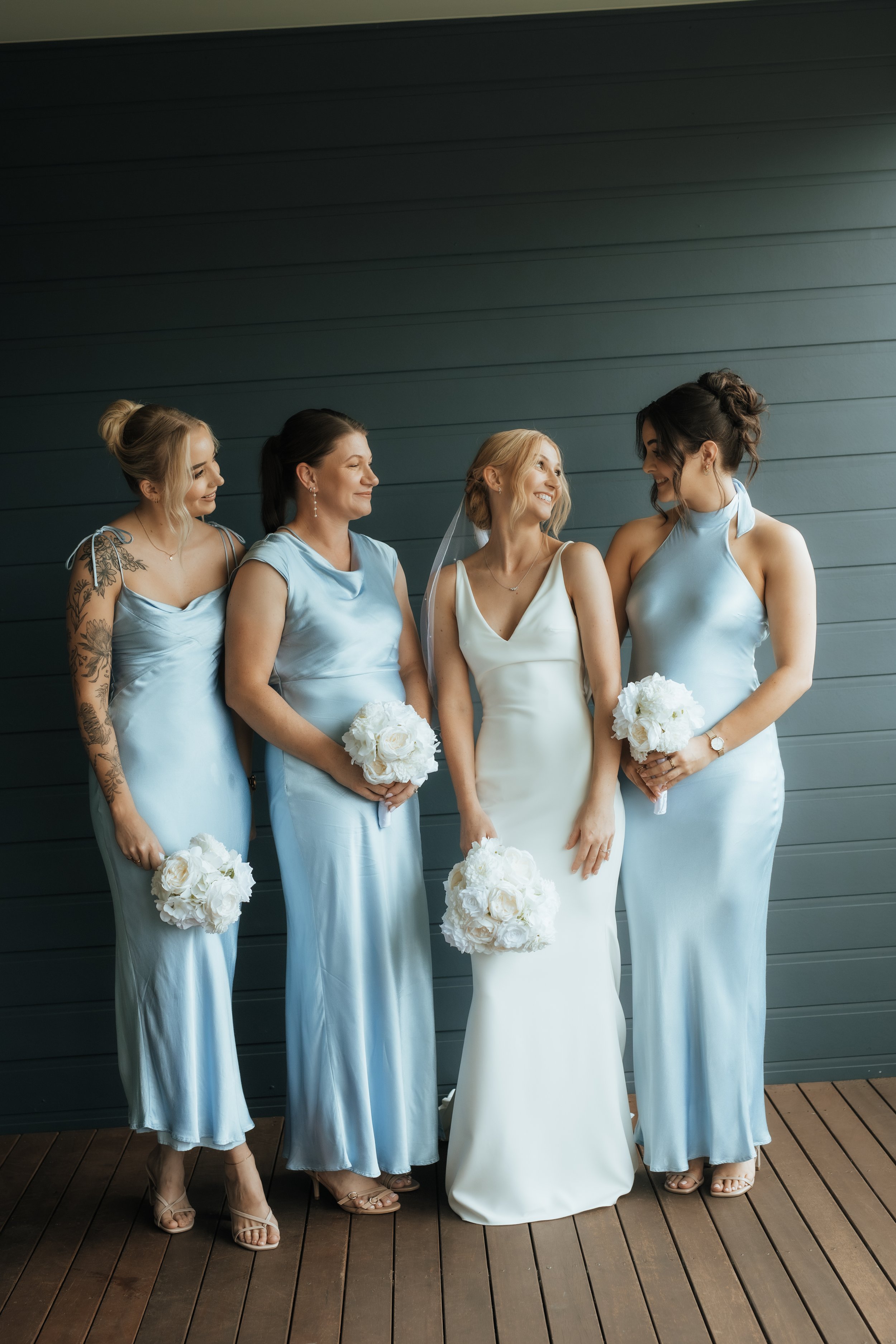Bridesmaids wearing light blue 