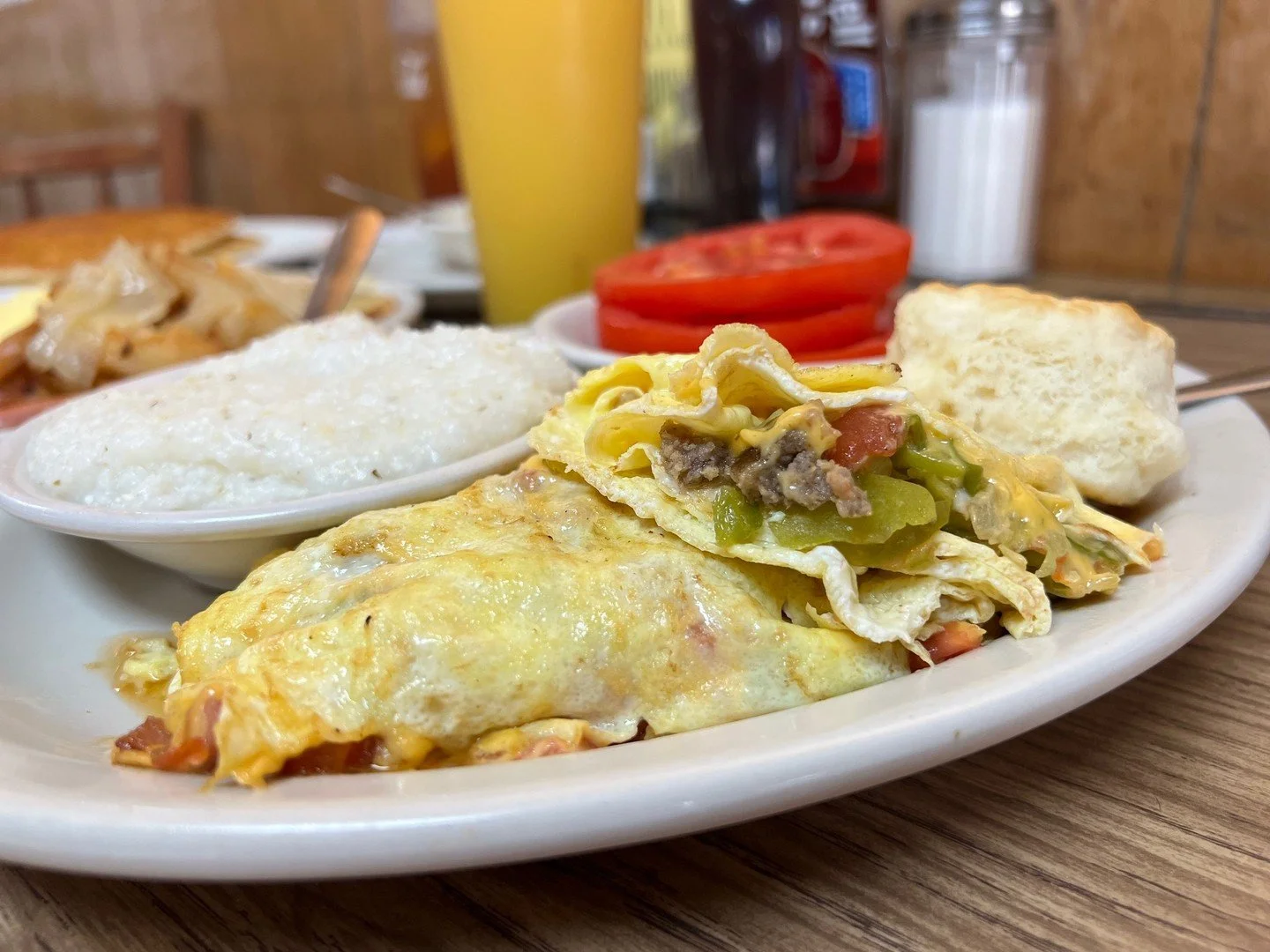 That Western omelet is loaded with more good stuff than Grandpa's tackle box. Add a biscuit and you've got yourself a breakfast worth waking up for.