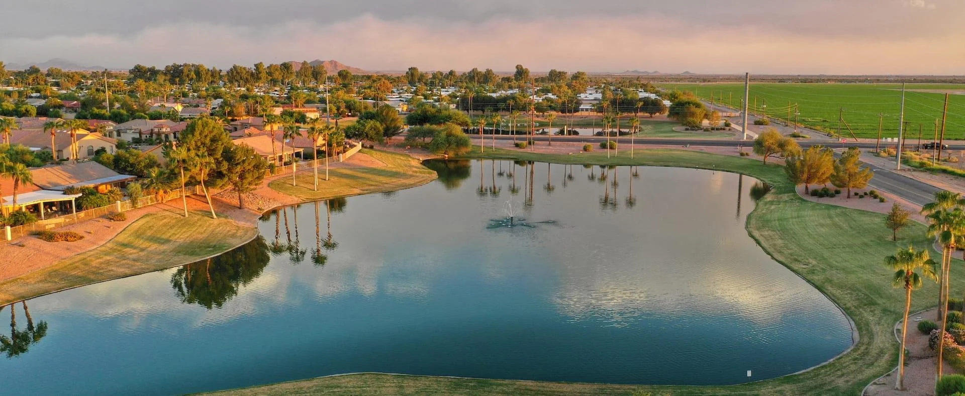 Canal-side residential community with palm trees and Southwestern architecture in Chandler, Arizona