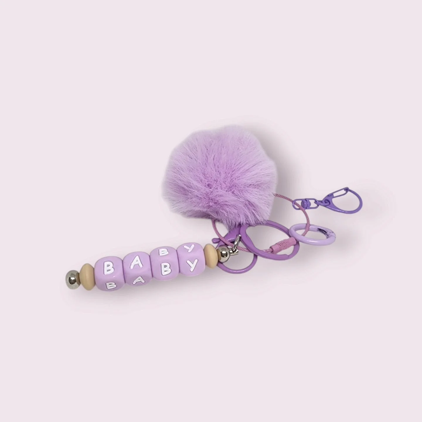 ✨ New Baby Keychains are here! ✨ These colorful keychains feature multiple clips, a soft pompom, and come in fun shades like purple, pink, black, and white. With &quot;BABY&quot; in silicone letters, they&rsquo;re perfect for a playful touch to your 