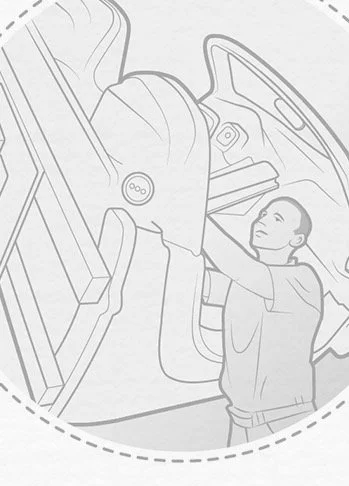 Detailillustration aus der Porsche Infografik: ein Werker bewegt das zweisitzige Monocoque des 918 Spyder an einem Hubwagen