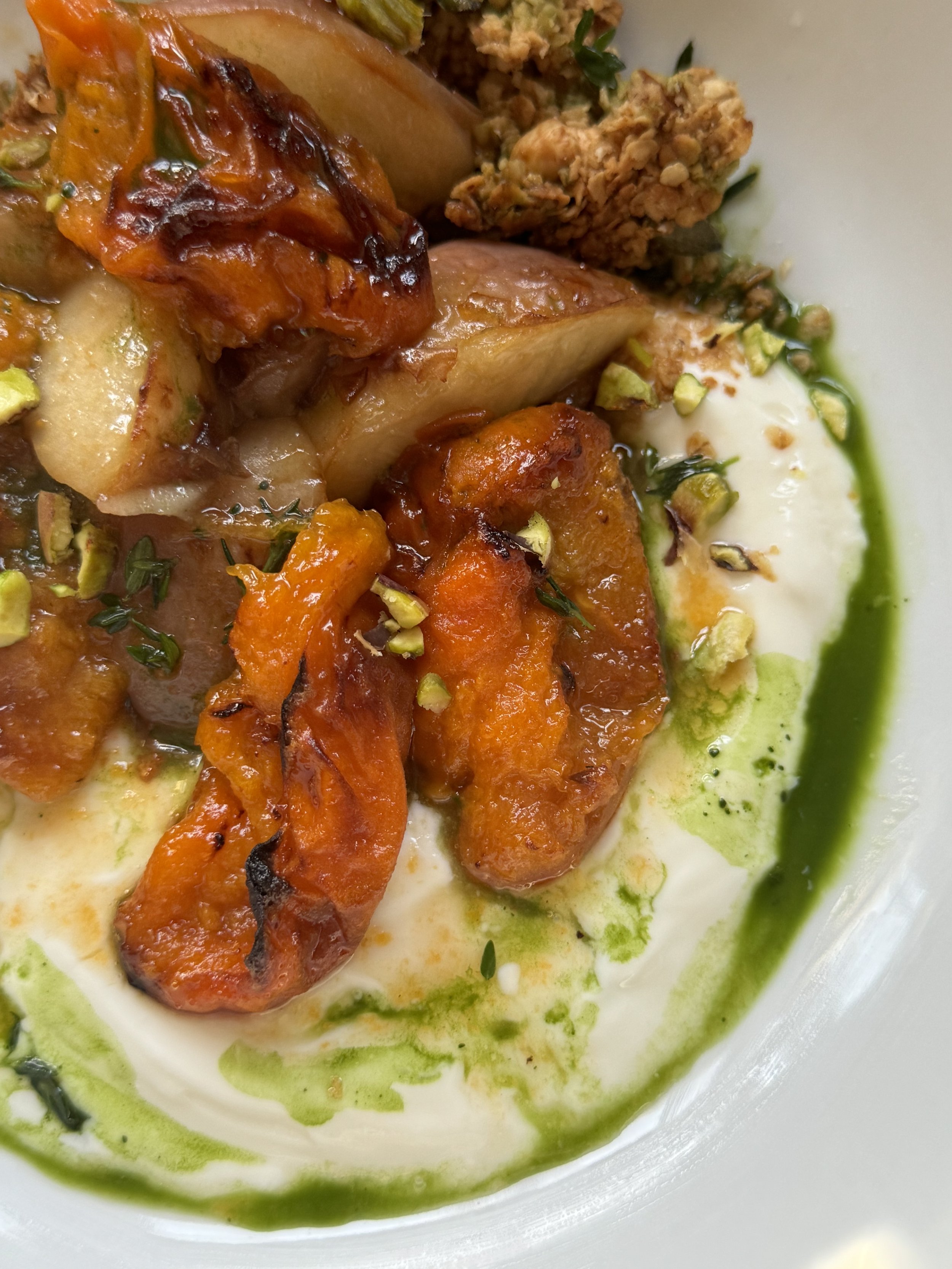 The Perfect Breakfast Bowl: Matcha, Baked Apple and Apricots, Granola, Pistachios, Honey & Greek Yogurt with a Touch of Thyme