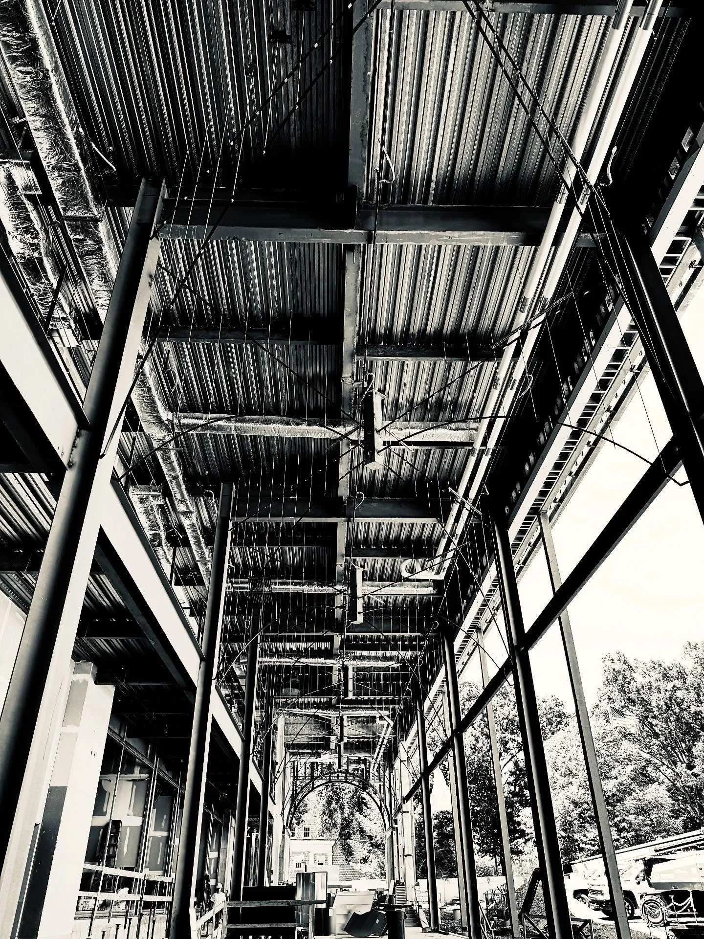 Under the arches&mdash;getting closer every day! 🏗️✨

Architect: Clark Nexsen 

#construction #burwil #burwilconstructioncompany #tennessee #bristol #knoxville #virginia #etsu #newconstruction