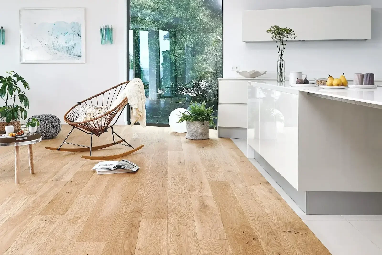 Luxury wide-plank wood flooring for open-plan living spaces in Sussex.