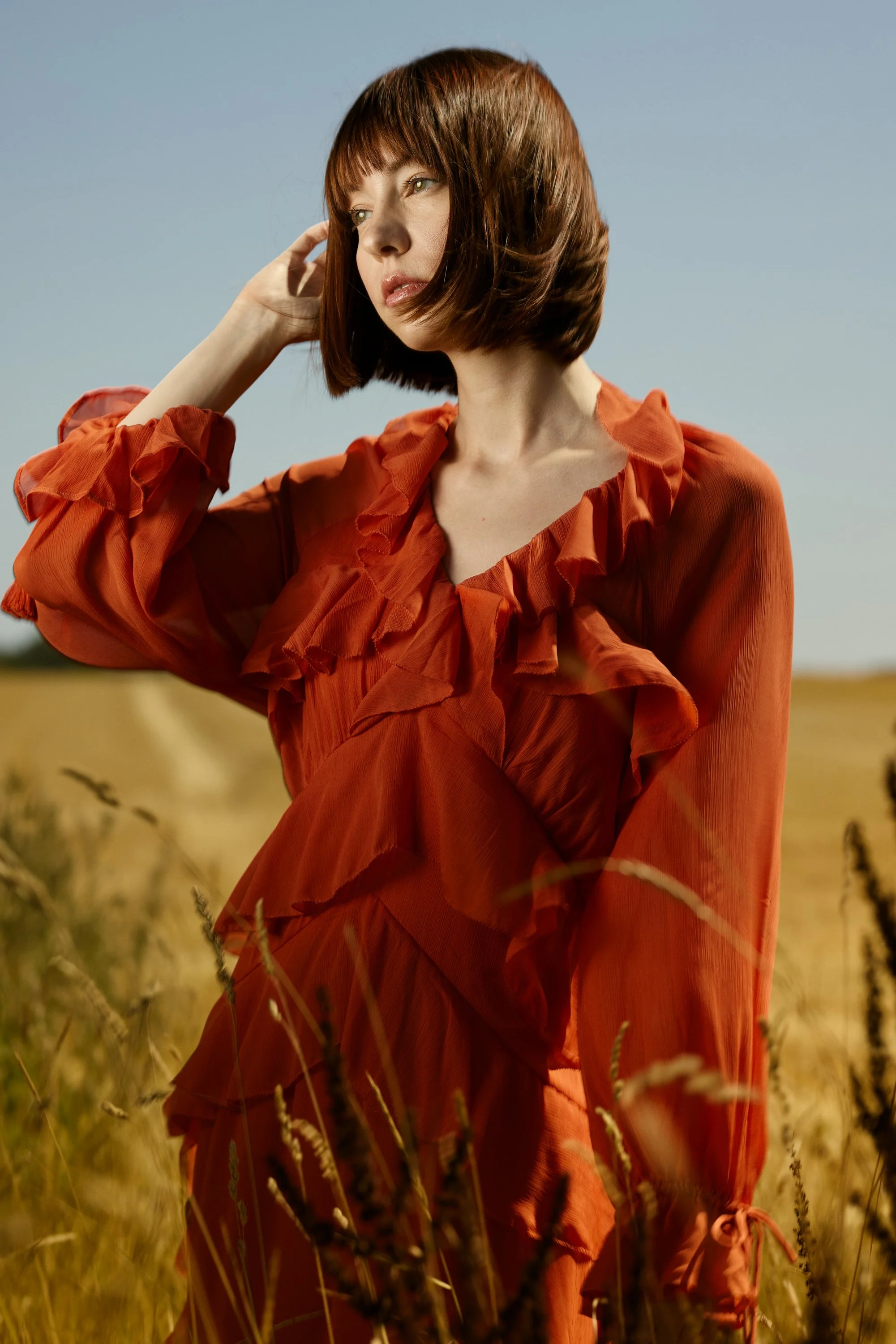 model in a red dress in grass 01.jpg