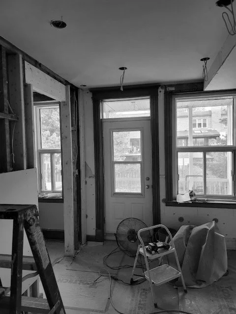 Sage green farmhouse kitchen before and after renovation, exposed wall and backyard entrance - Interior design by ABtelier Design, NDG Montreal