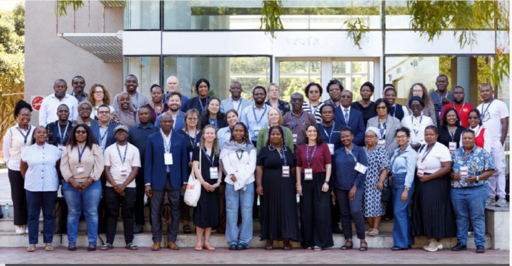 group photo of delegates at symposium