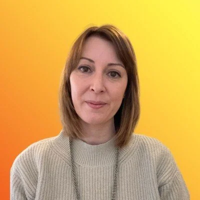 Picture of professional translator, Stefanie Mellano, against an orange and yellow background.