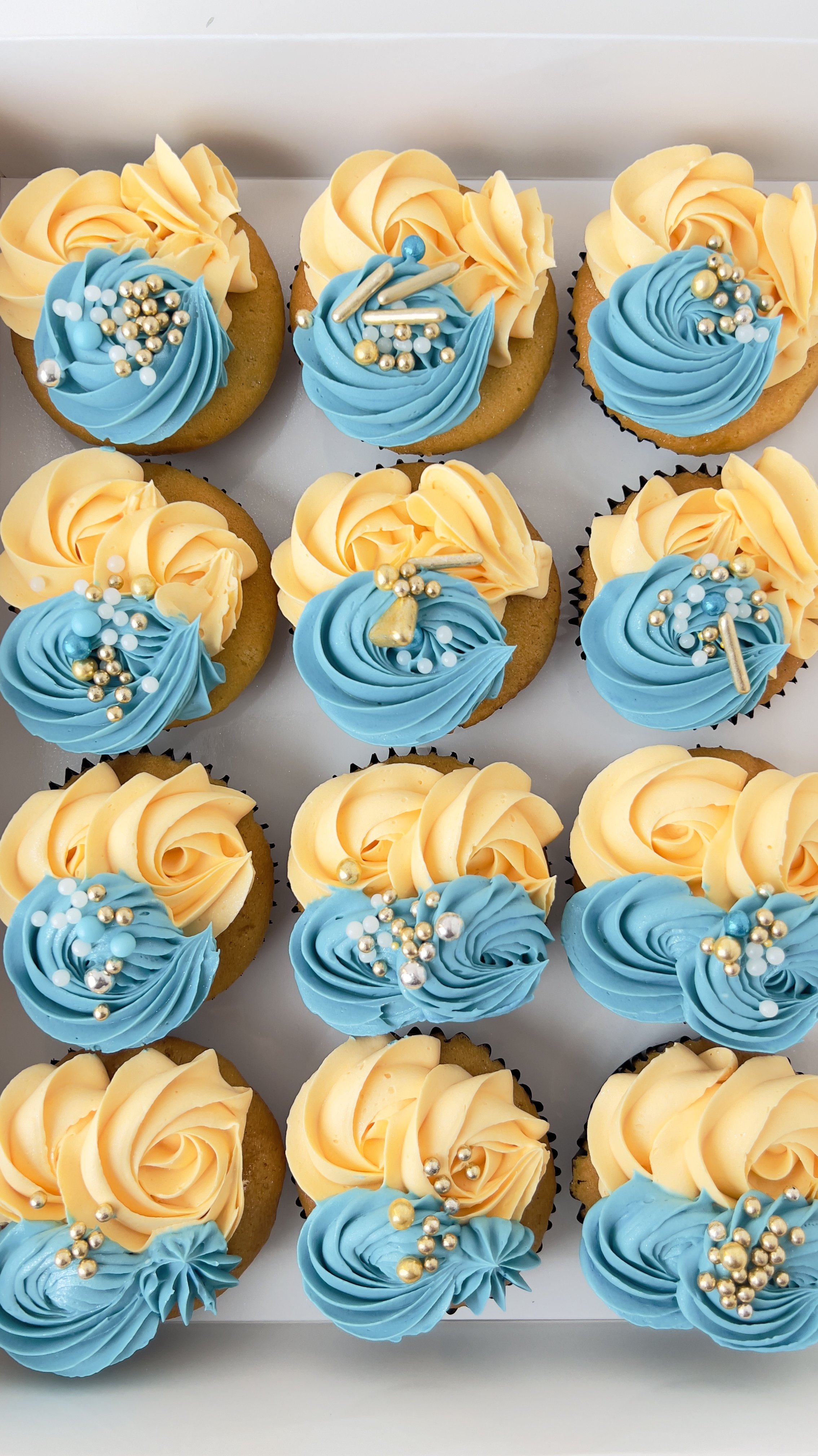 Box of 12 Teal and Cream Cupcakes by Sensational Cakes and Desserts.