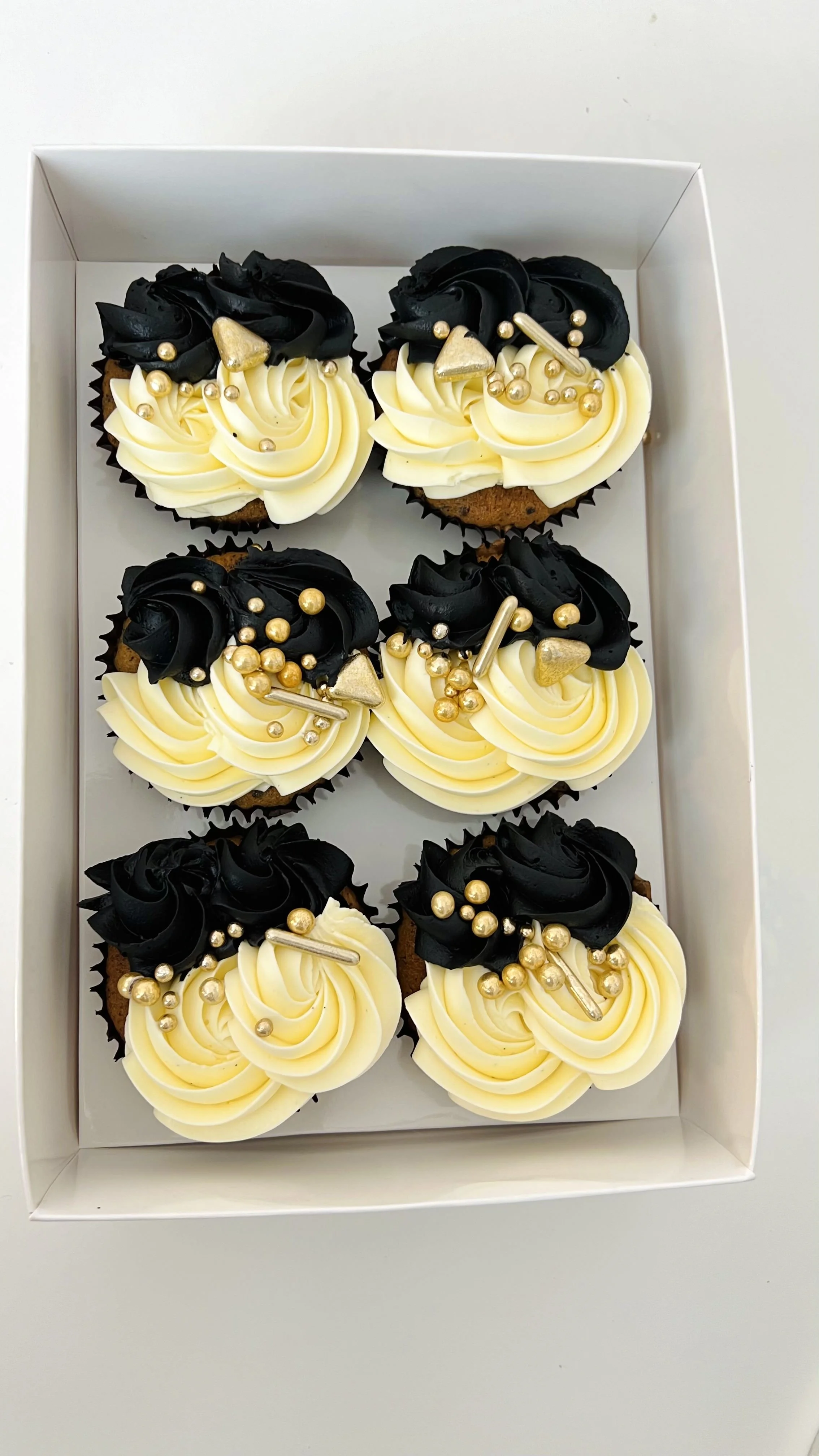 Matching mini heart cake and cupcakes by Sensational Cakes and Desserts.