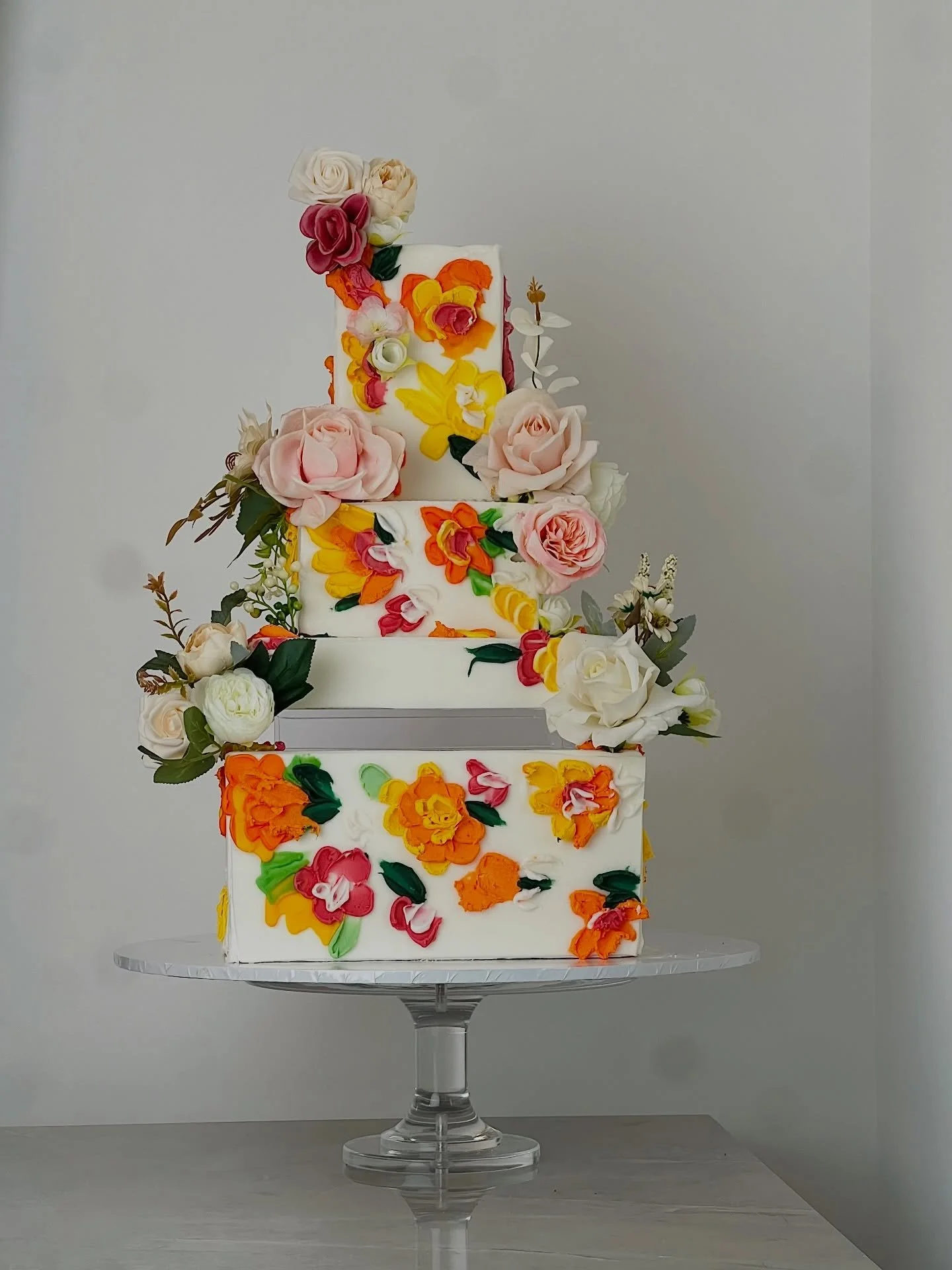 Bold colours. Delicate petals. A whole lot of love ❤️

Made for the adventurous couple who aren&rsquo;t afraid to make a statement.

Wedding cake bookings are now open for 2026 &amp; 2027 couples.
Consultations available online or in person.

📩 Book