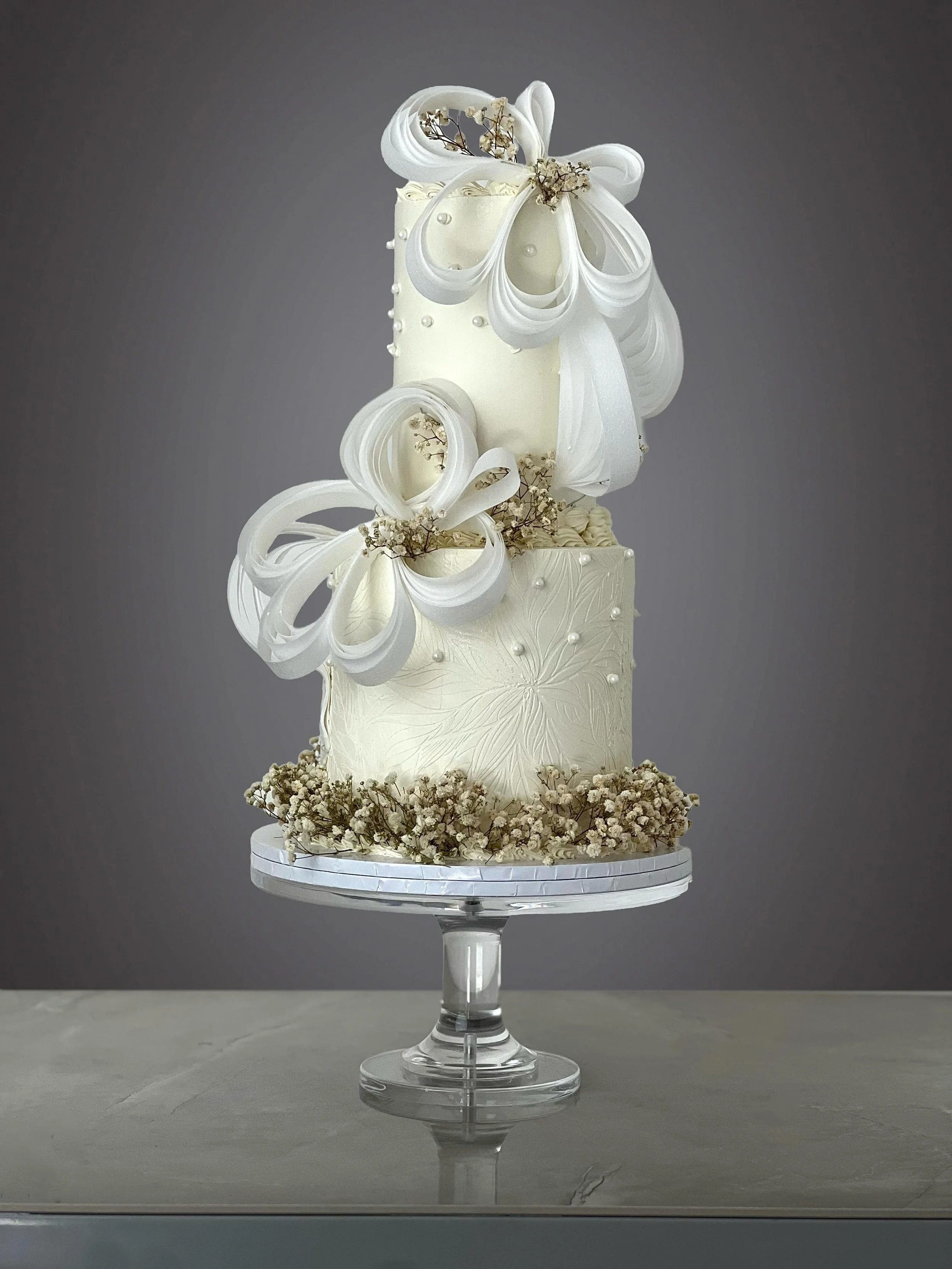 Wedding cake for Mica and Sean.

The bride sent me a sketch of what she wanted the cake to look like and we brought that to life.
Our calendar for the summer months are getting booked fast.

Need a cake?
Please use the link in the bio or send a DM.
#
