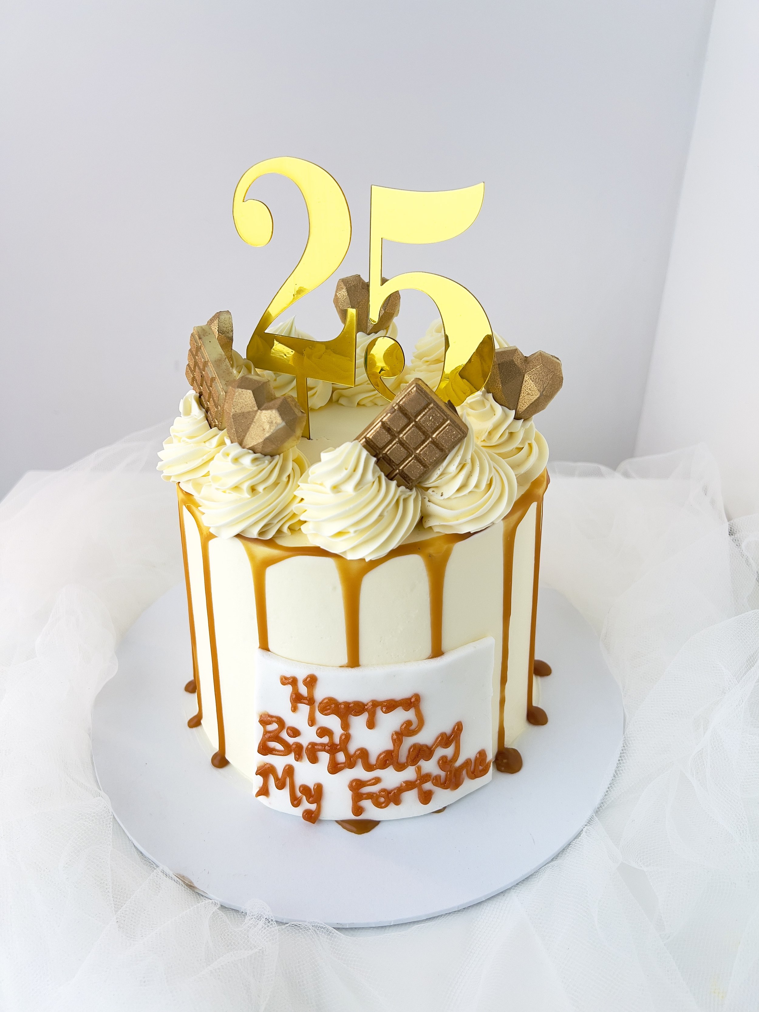 Caramel Drip Cake With Number Topper by Sensational Cakes and Desserts.