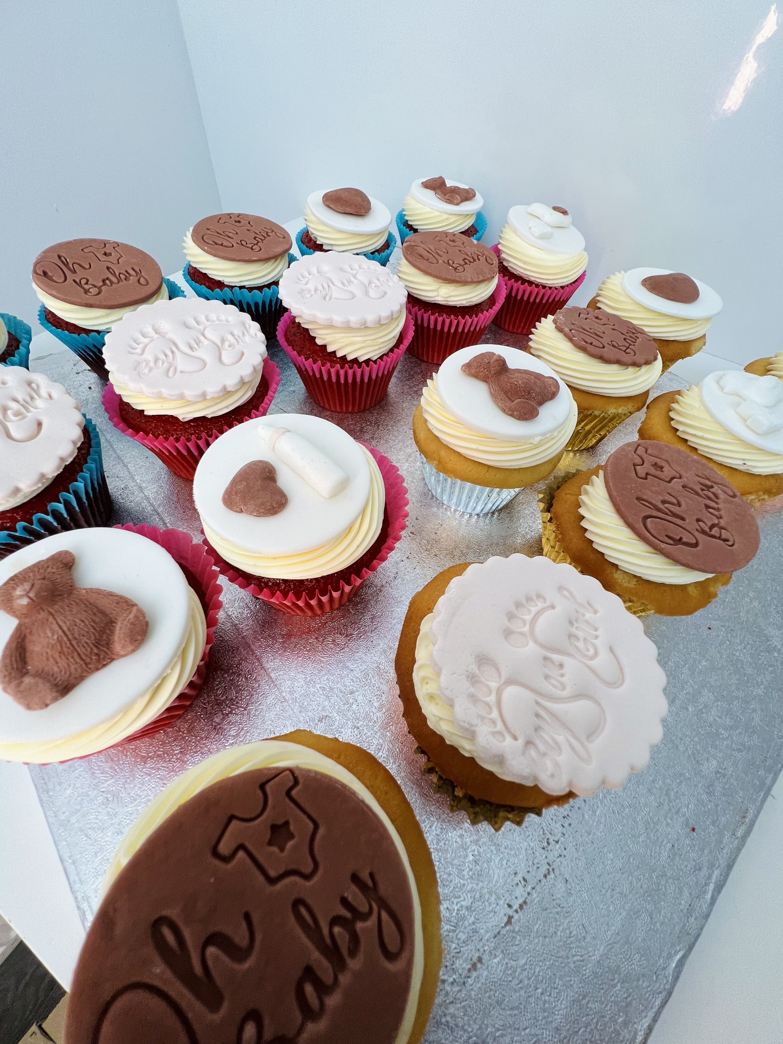 Gender Reveal/Baby Shower Cupcake Selection by Sensational Cakes and Desserts.