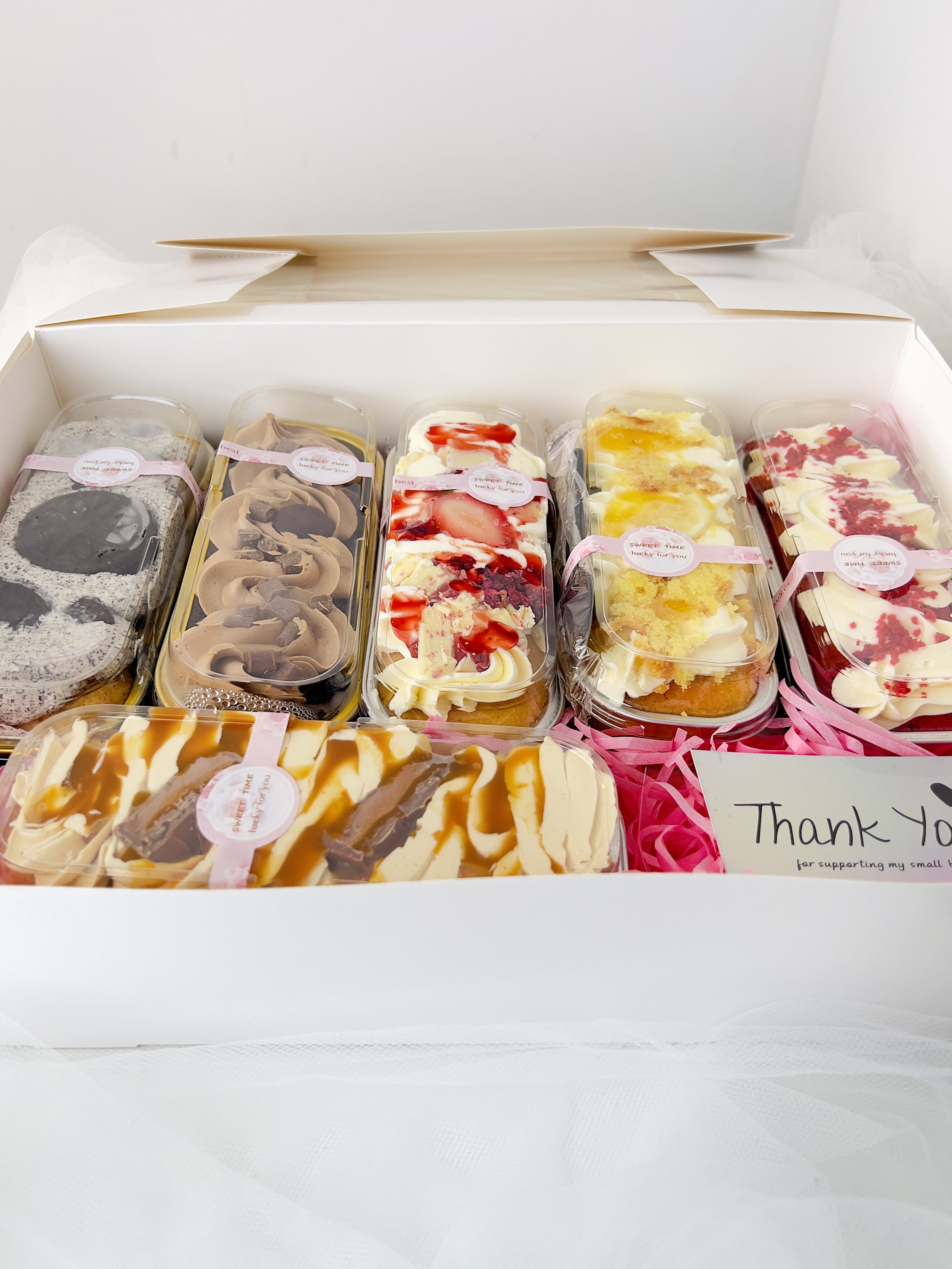 Mini Loaf Cake Selection Box - features an array of 6 flavours: Chocolate Fudge, Cookies and Cream, Lemon, Red Velvet, Salted Caramel and Vanilla